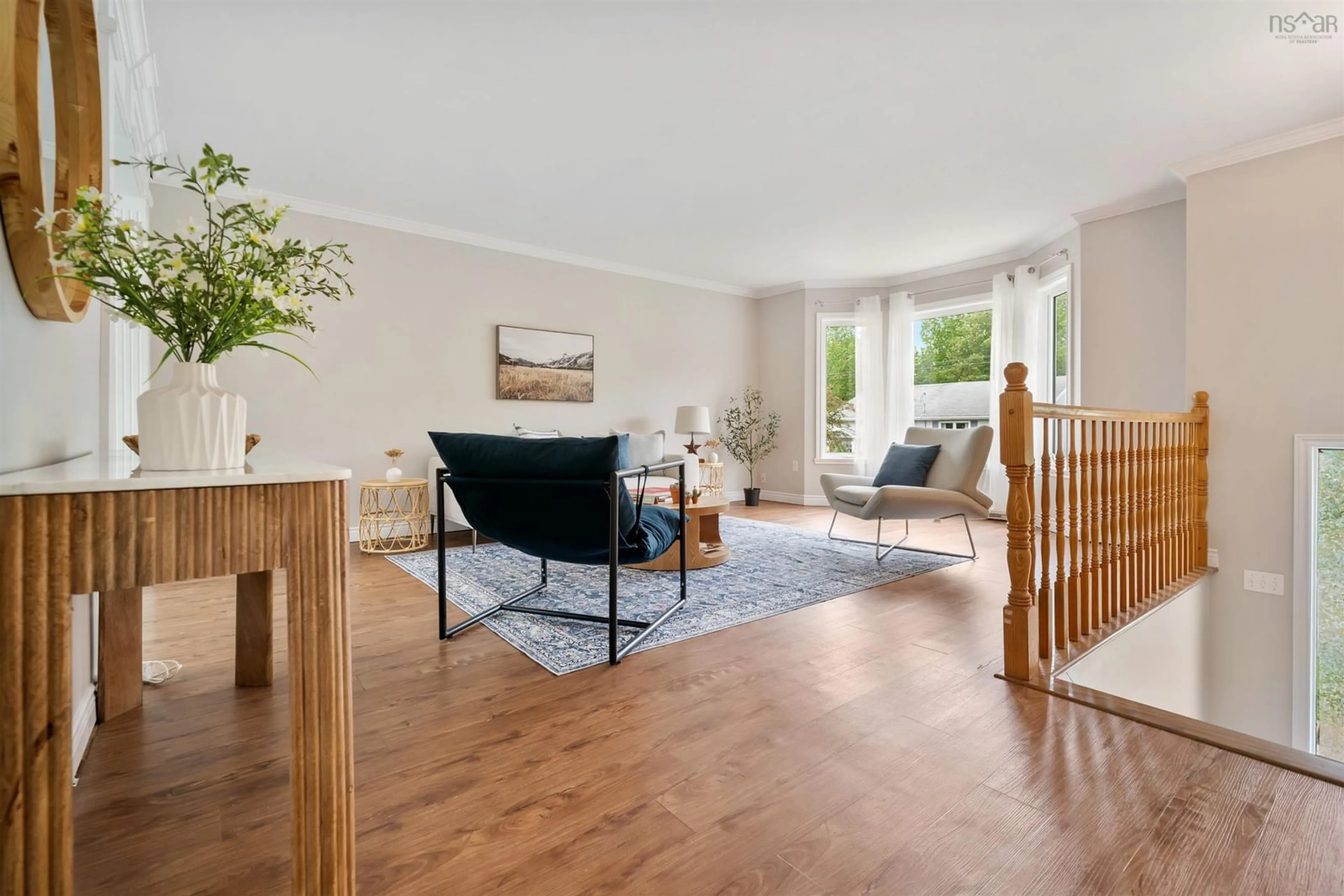 Living room with furniture, wood/laminate floor for 53 Victoria Dr, Lower Sackville Nova Scotia B4C 4C4