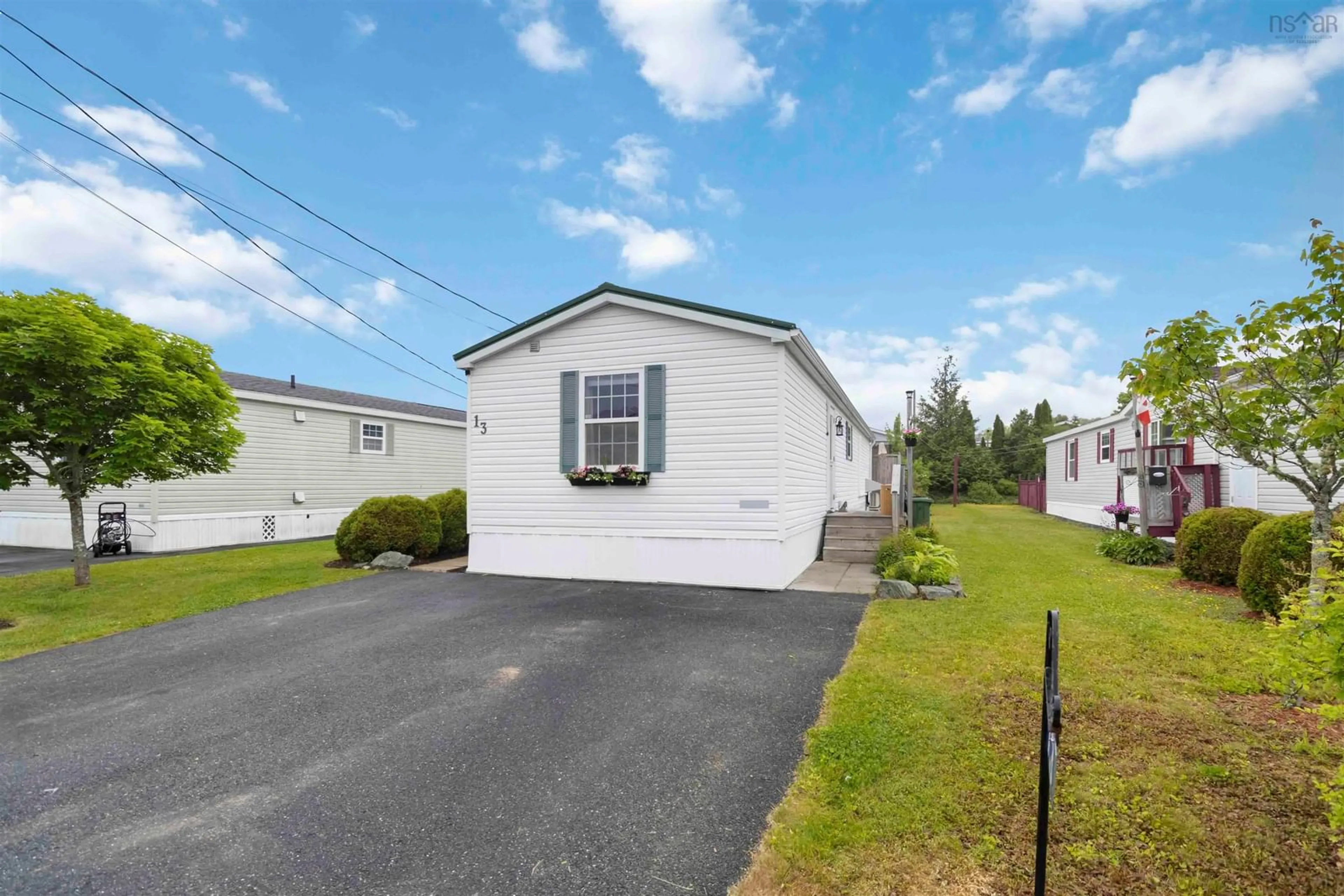 Home with vinyl exterior material, street for 13 Belmont Dr, Bridgewater Nova Scotia B4V 4E6