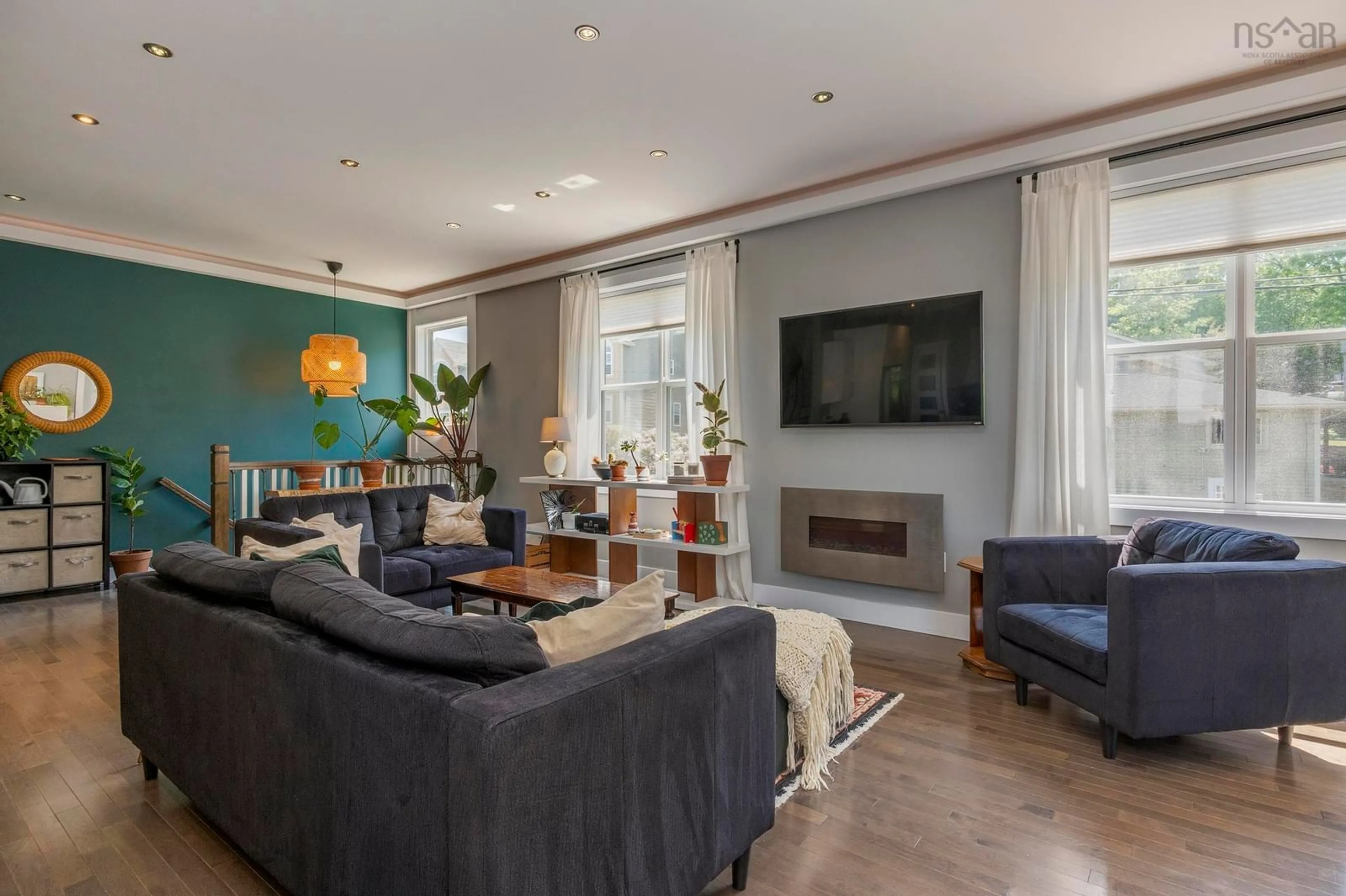 Living room with furniture, wood/laminate floor for 8 Four Mile Lane, Halifax Nova Scotia B3M 0E2