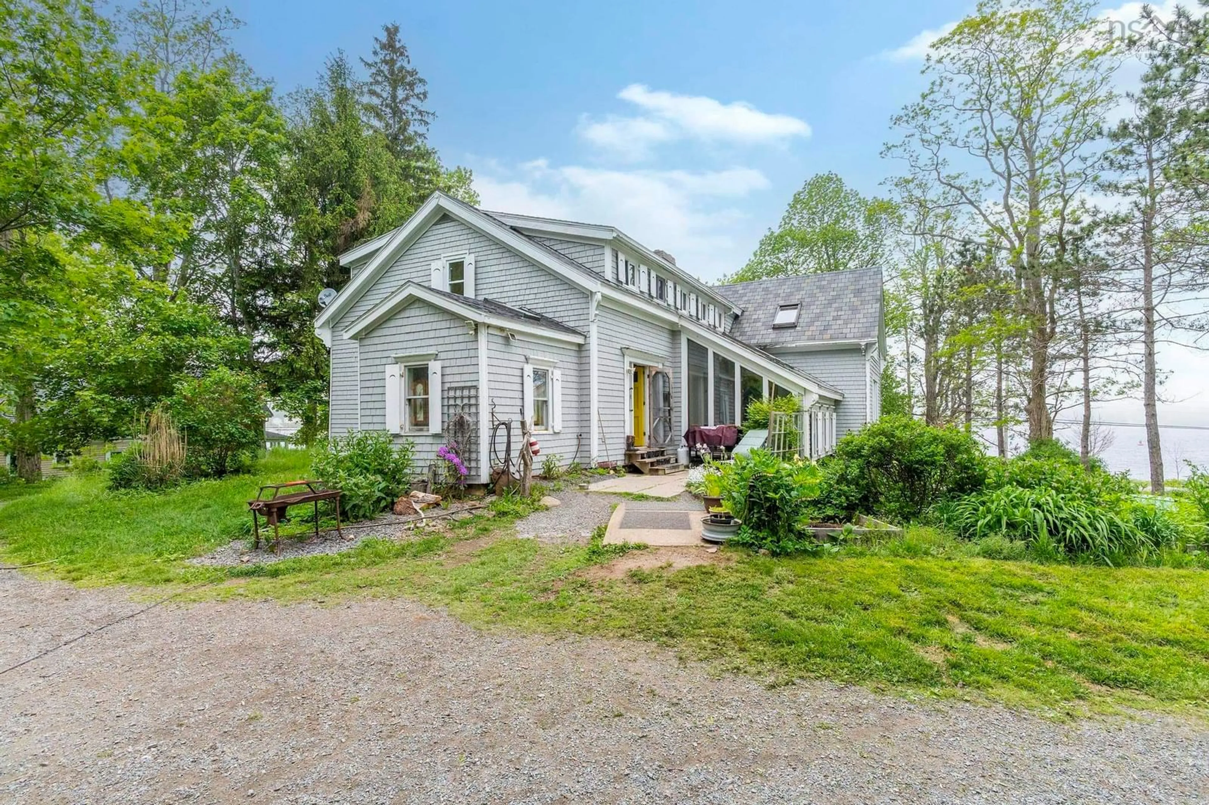 A pic from outside/outdoor area/front of a property/back of a property/a pic from drone, street for 836 Main Street, Mahone Bay Nova Scotia B0J 2E0