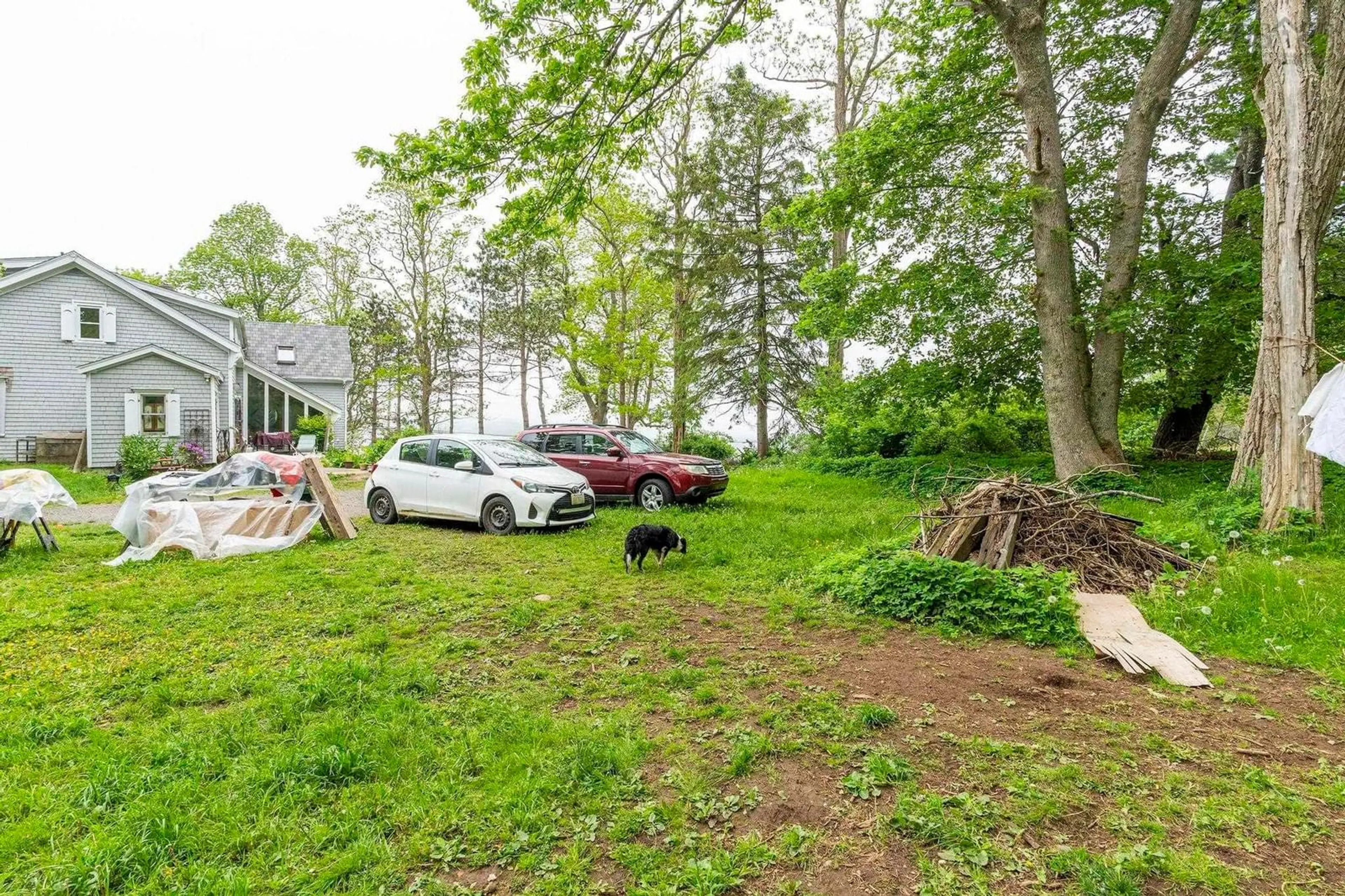 A pic from outside/outdoor area/front of a property/back of a property/a pic from drone, street for 836 Main Street, Mahone Bay Nova Scotia B0J 2E0