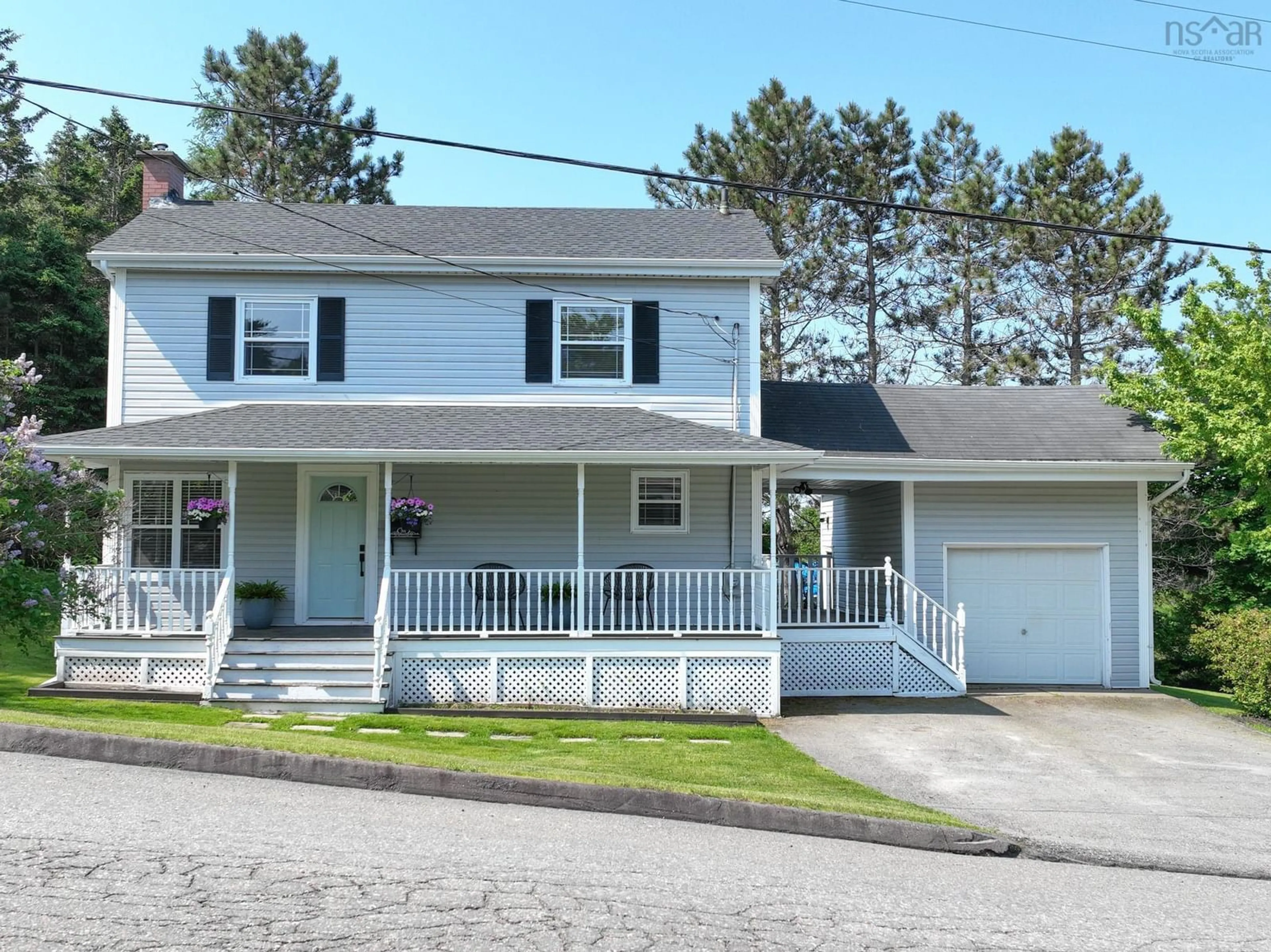 Home with vinyl exterior material, street for 26 Woodlawn Dr, Sydney River Nova Scotia B1S 1H9