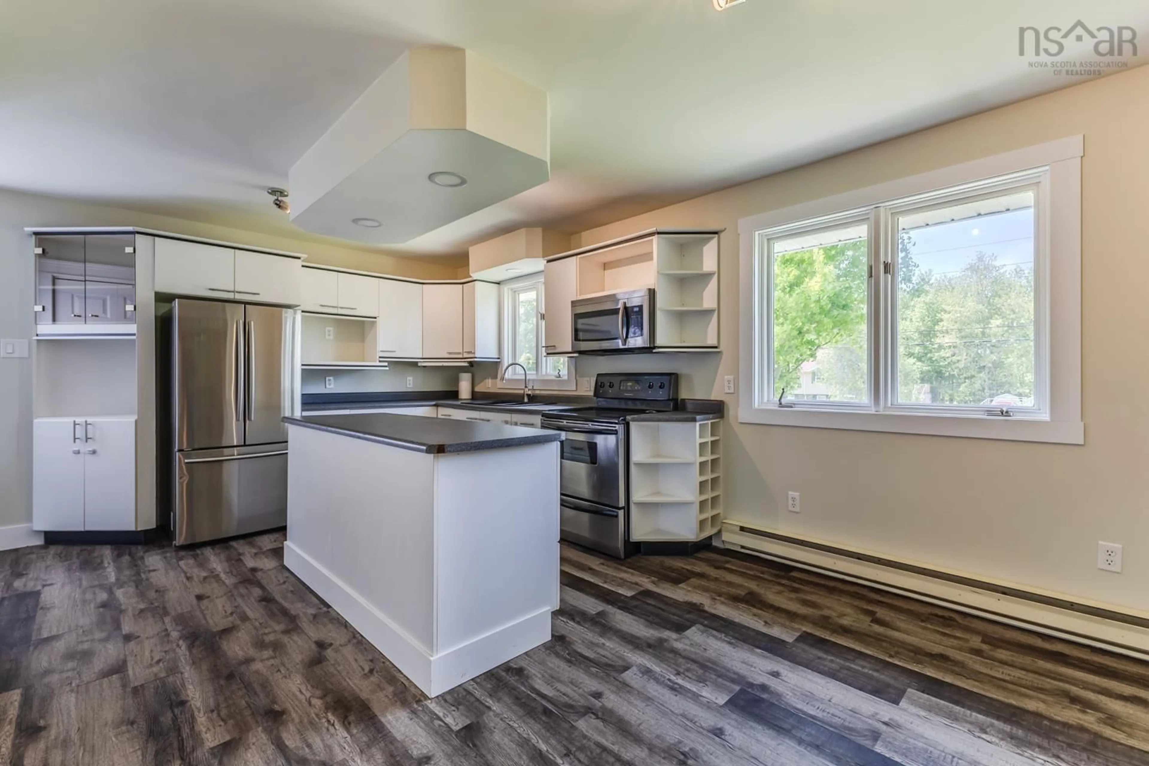 Open concept kitchen, wood/laminate floor for 21 Delaney Dr, Valley Nova Scotia B2N 3K3