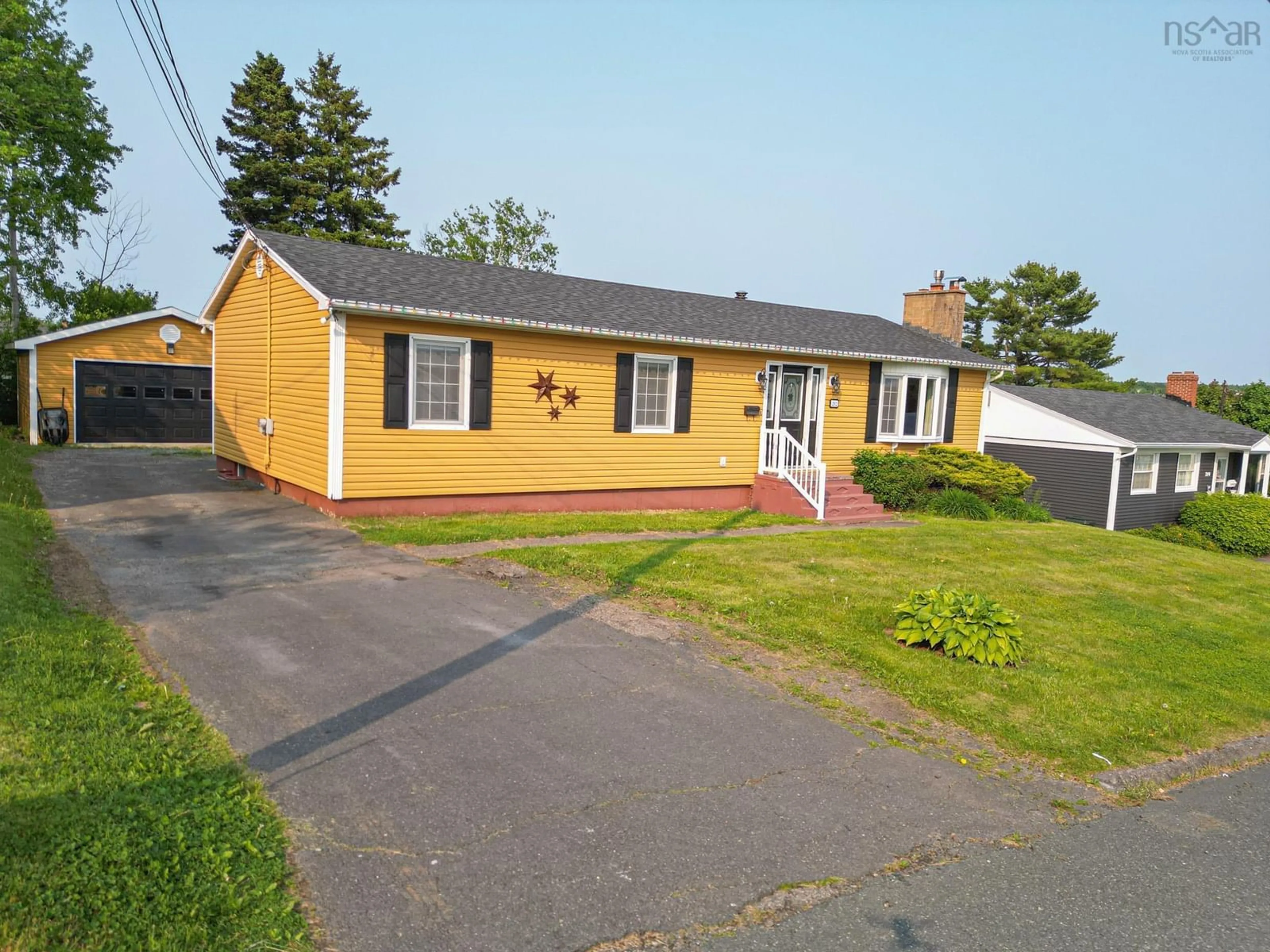 A pic from outside/outdoor area/front of a property/back of a property/a pic from drone, street for 202 Leeside, Coxheath Nova Scotia B1R 1S6