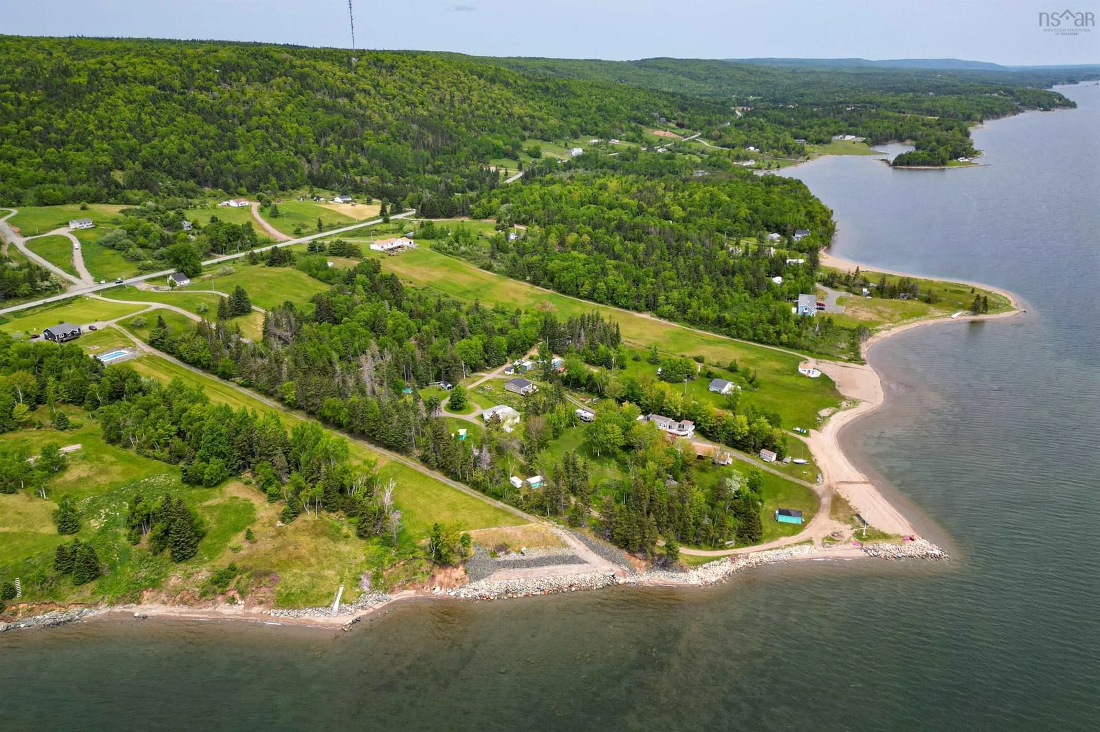 A pic from outside/outdoor area/front of a property/back of a property/a pic from drone, water/lake/river/ocean view for 100 Barrington Lane, North Side East Bay Nova Scotia B1J 1H1