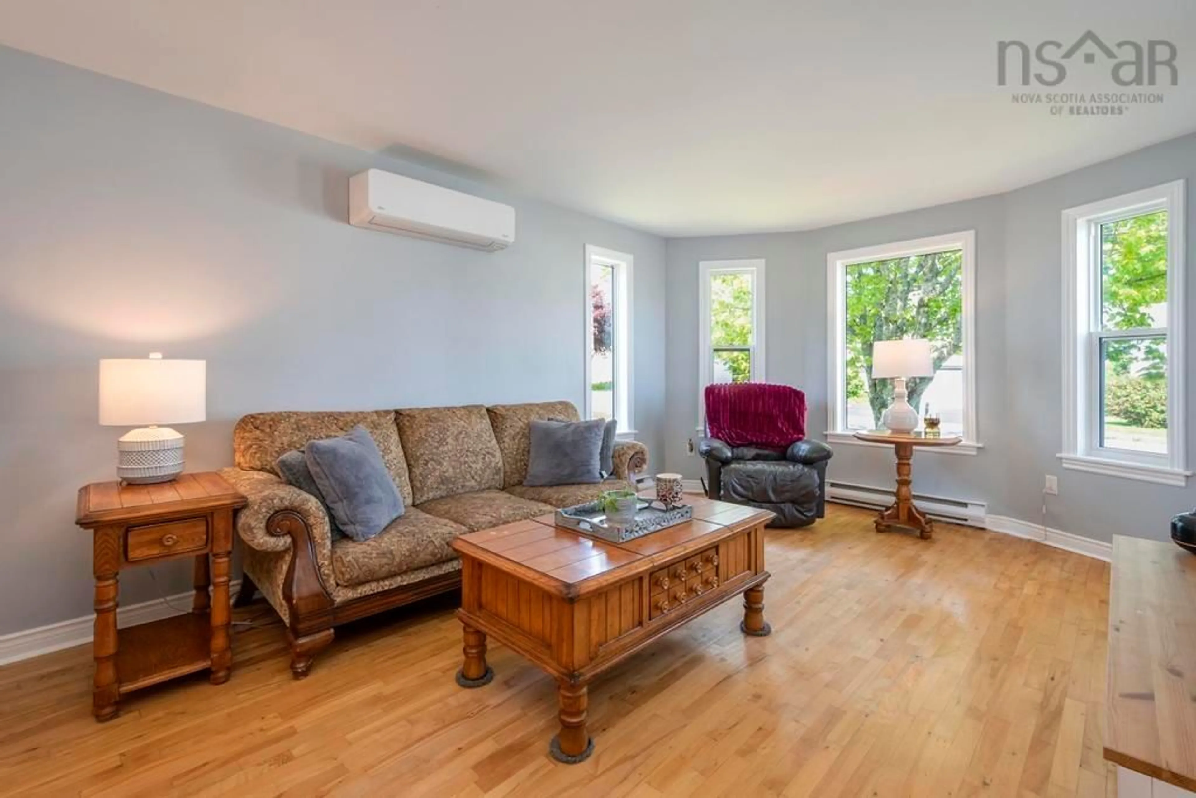 Living room with furniture, wood/laminate floor for 21 Antares Crt, Dartmouth Nova Scotia B2W 6G1