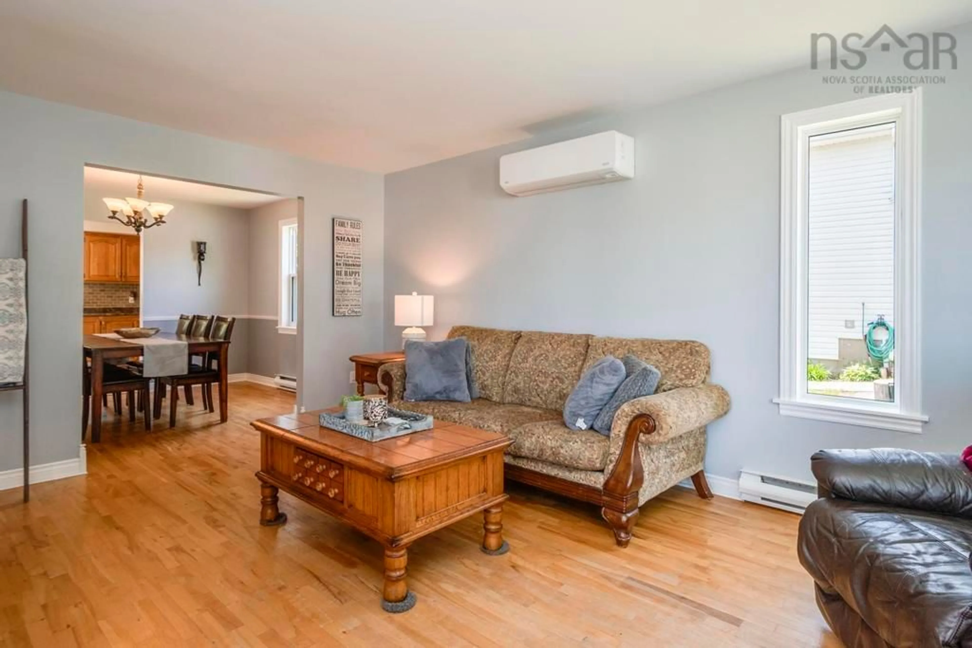 Living room with furniture, wood/laminate floor for 21 Antares Crt, Dartmouth Nova Scotia B2W 6G1