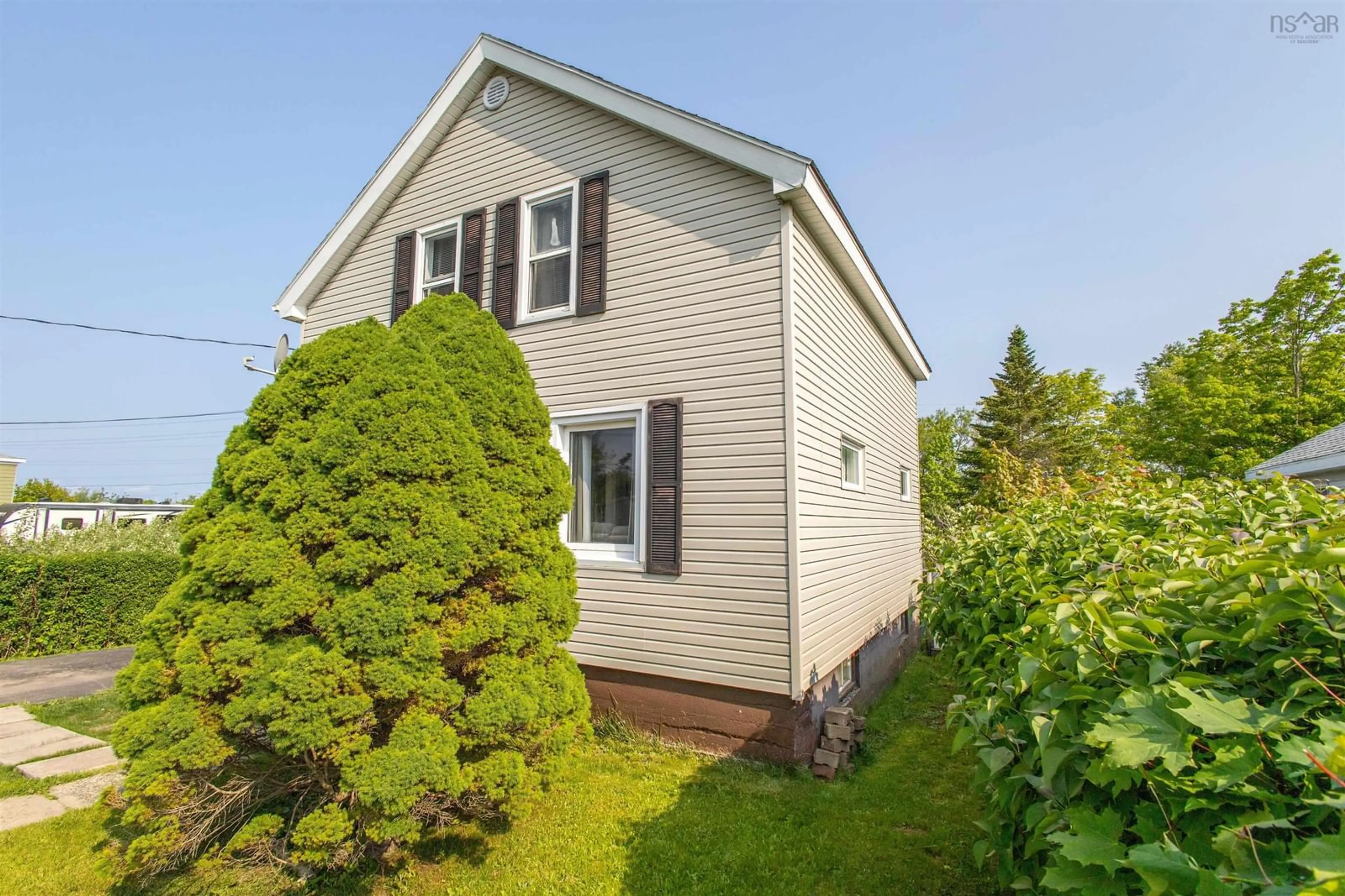 Home with vinyl exterior material, street for 123 Vulcan Ave, Sydney Nova Scotia B1P 5W3