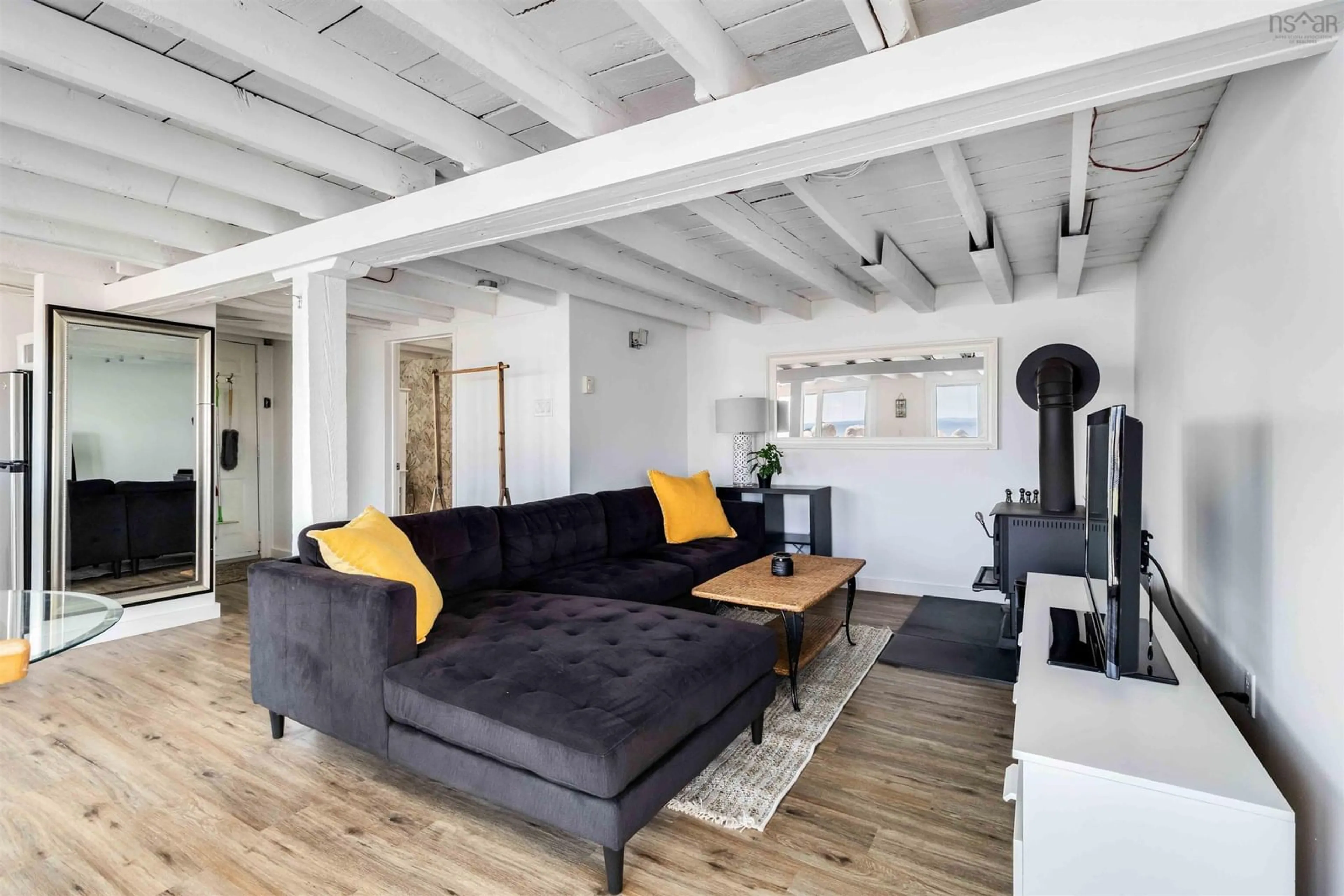 Living room with furniture, unknown for 299 Mill Cove Shore Rd, Mill Cove Nova Scotia B0J 1T0