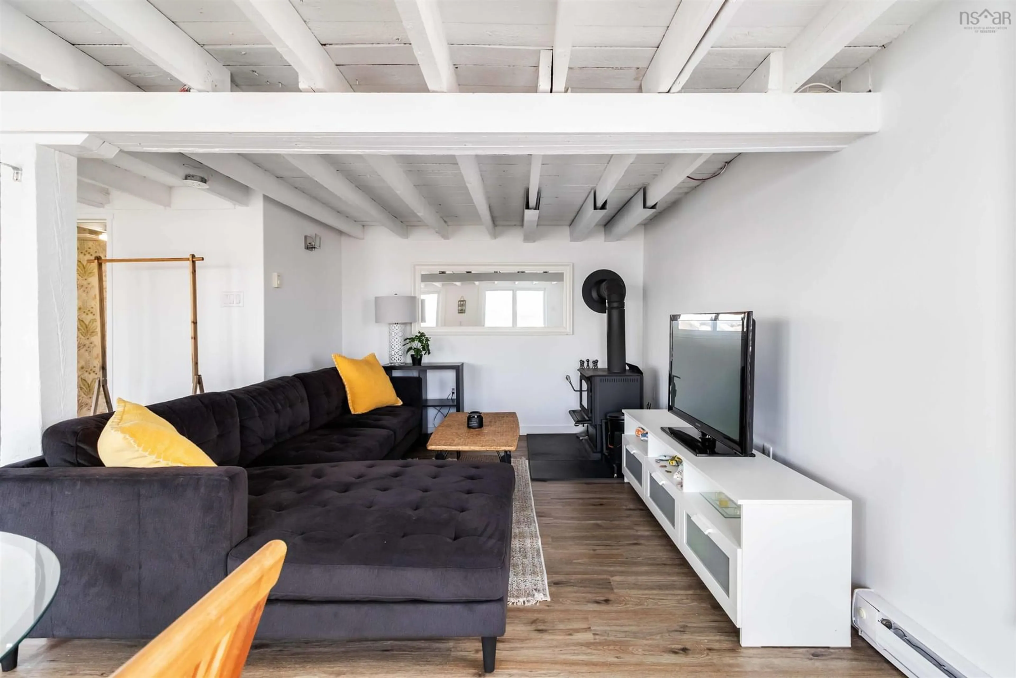 Living room with furniture, unknown for 299 Mill Cove Shore Rd, Mill Cove Nova Scotia B0J 1T0