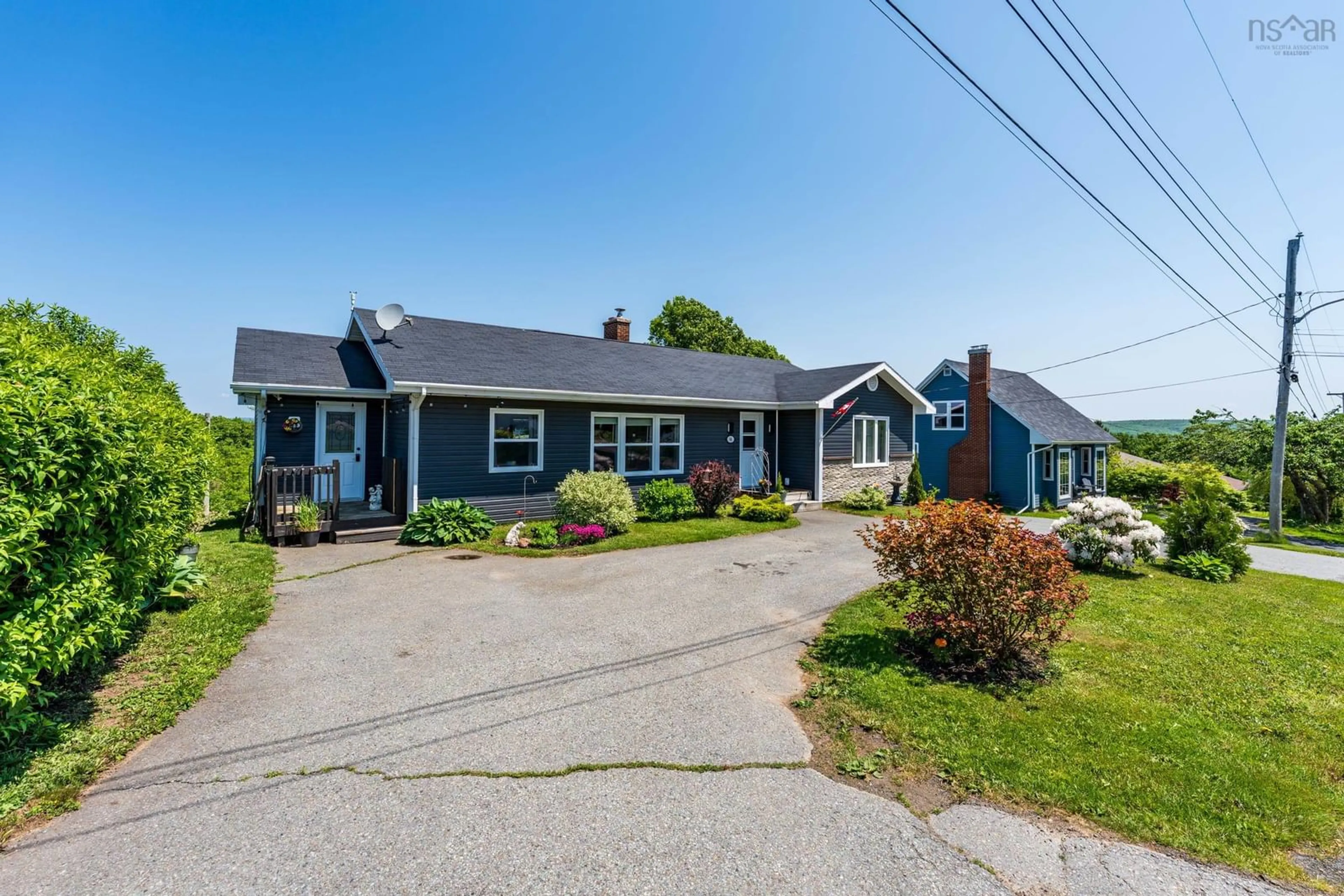 A pic from outside/outdoor area/front of a property/back of a property/a pic from drone, street for 94 King Street, Digby Nova Scotia B0V 1A0