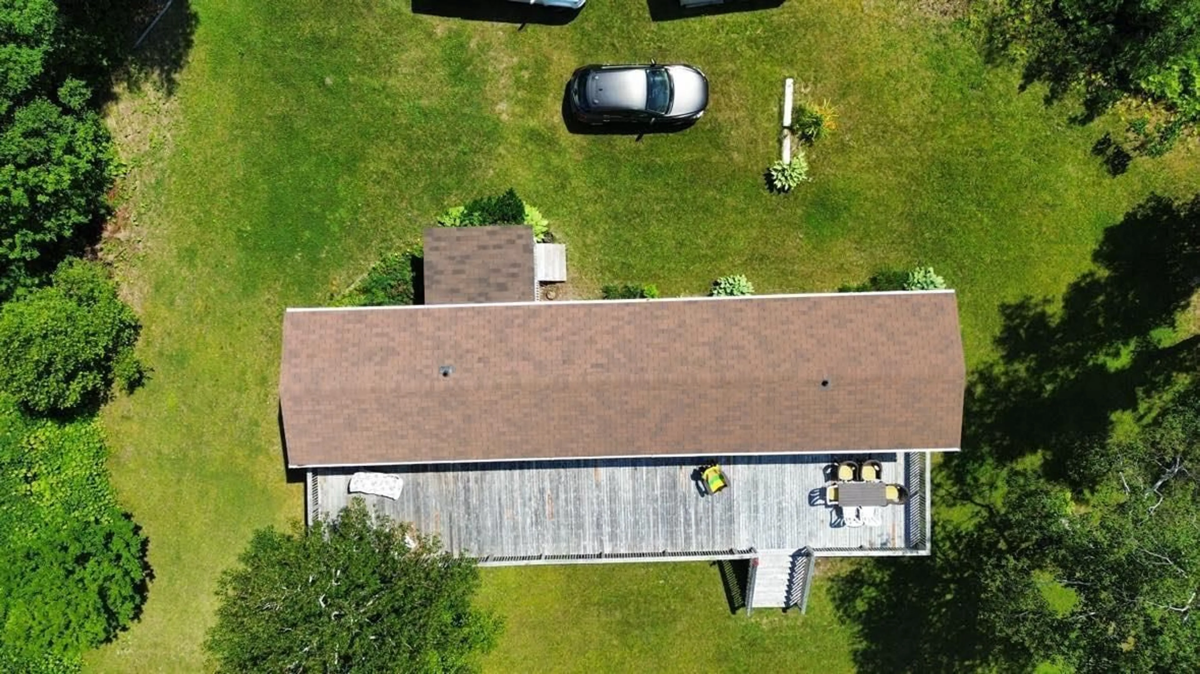 A pic from outside/outdoor area/front of a property/back of a property/a pic from drone, building for 8934 East Bay Hwy, Middle Cape Nova Scotia B1J 2A4