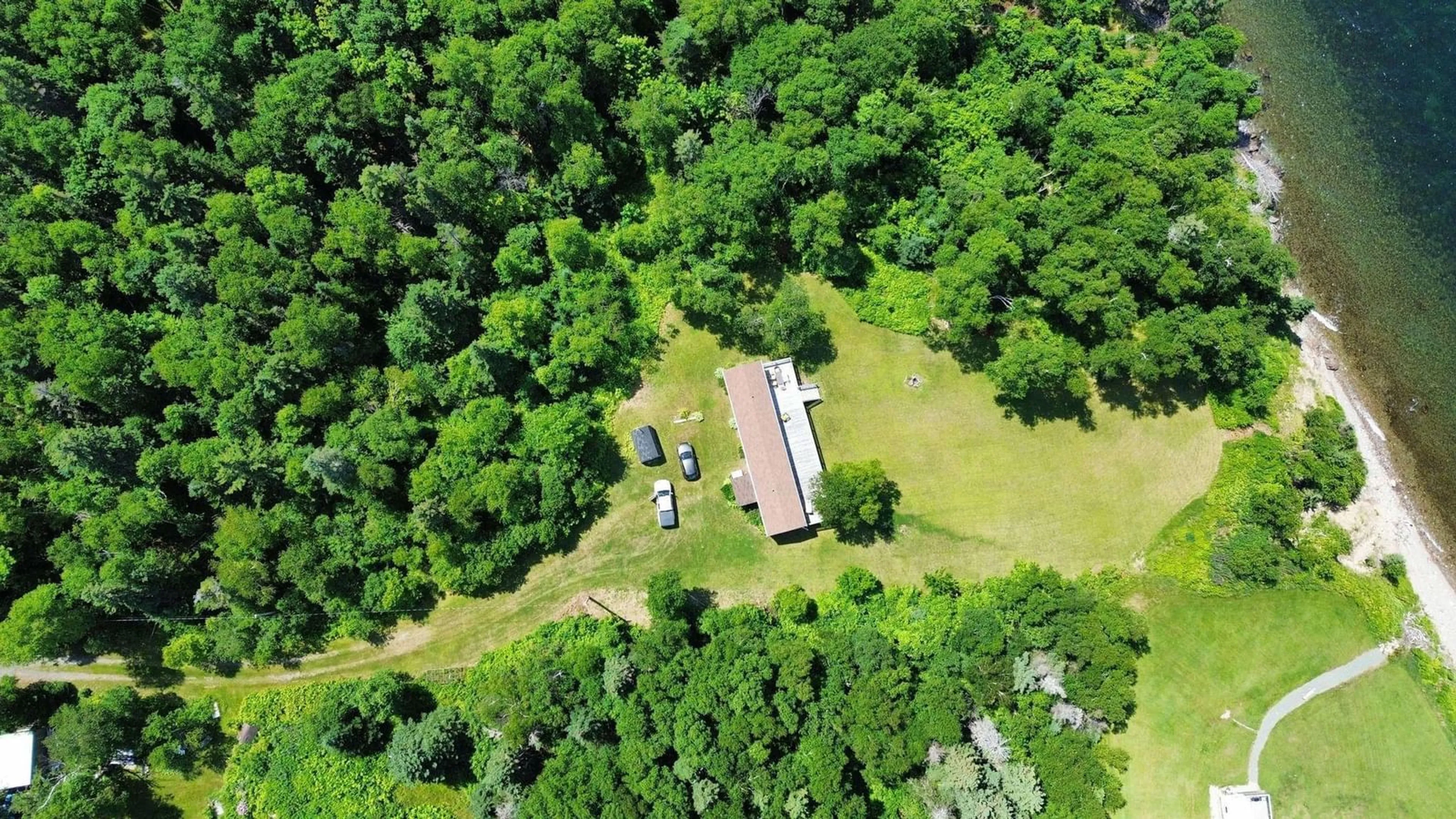 A pic from outside/outdoor area/front of a property/back of a property/a pic from drone, forest/trees view for 8934 East Bay Hwy, Middle Cape Nova Scotia B1J 2A4