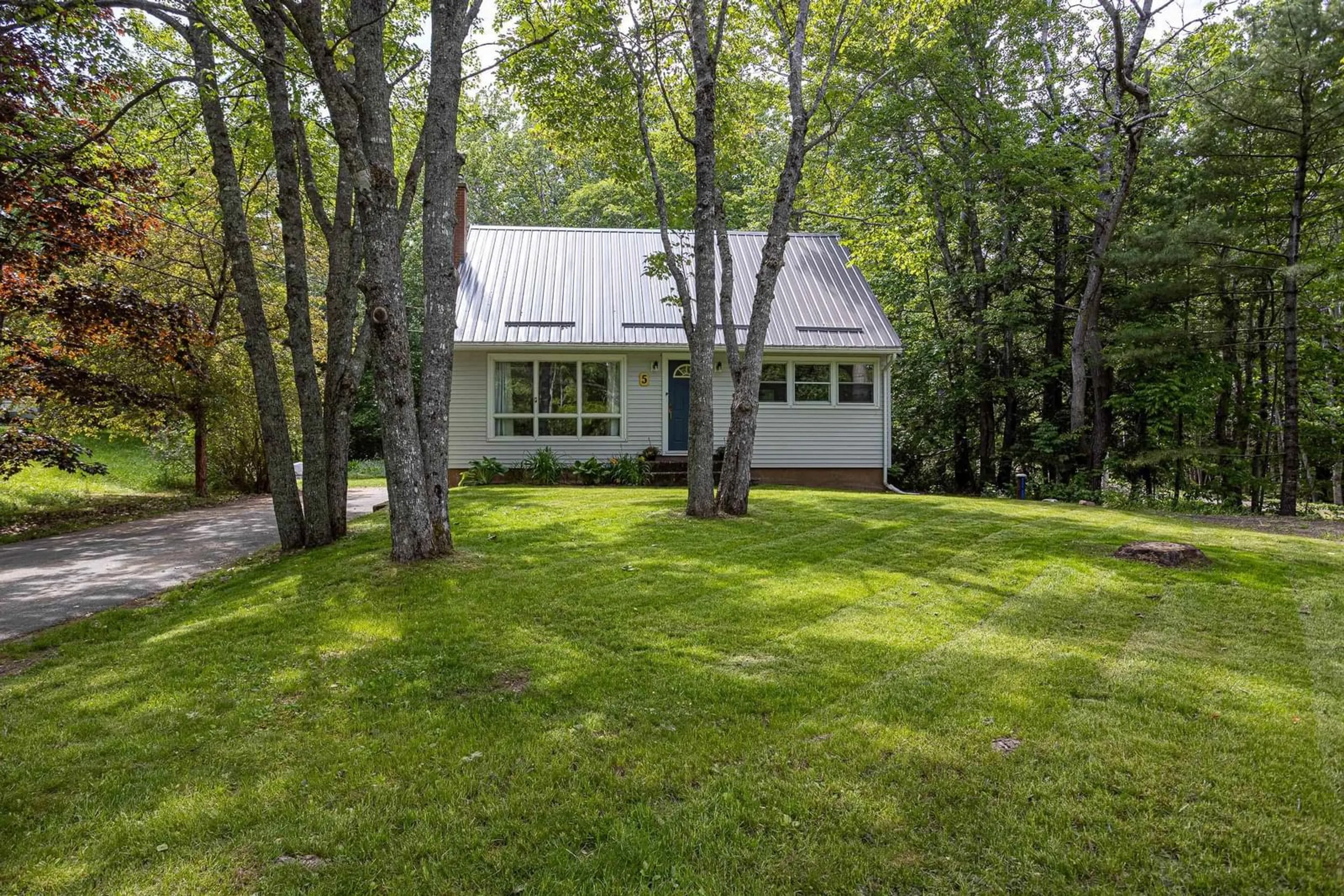 A pic from outside/outdoor area/front of a property/back of a property/a pic from drone, unknown for 5 Oakleaf Cres, Grand Lake Nova Scotia B2T 1B3