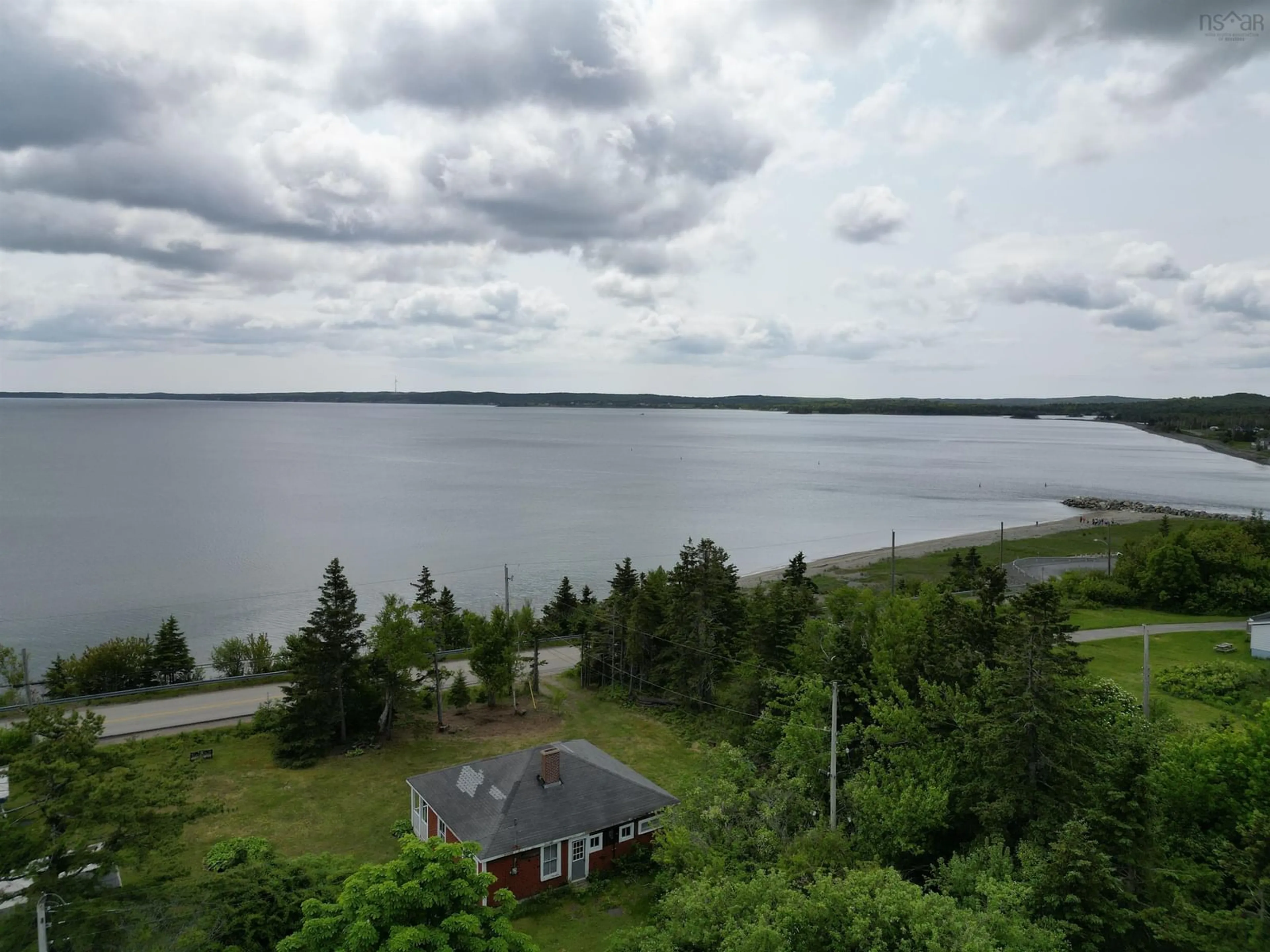 A pic from outside/outdoor area/front of a property/back of a property/a pic from drone, water/lake/river/ocean view for 14 Mira Bay Drive, Mira Gut Nova Scotia B1K 2X5