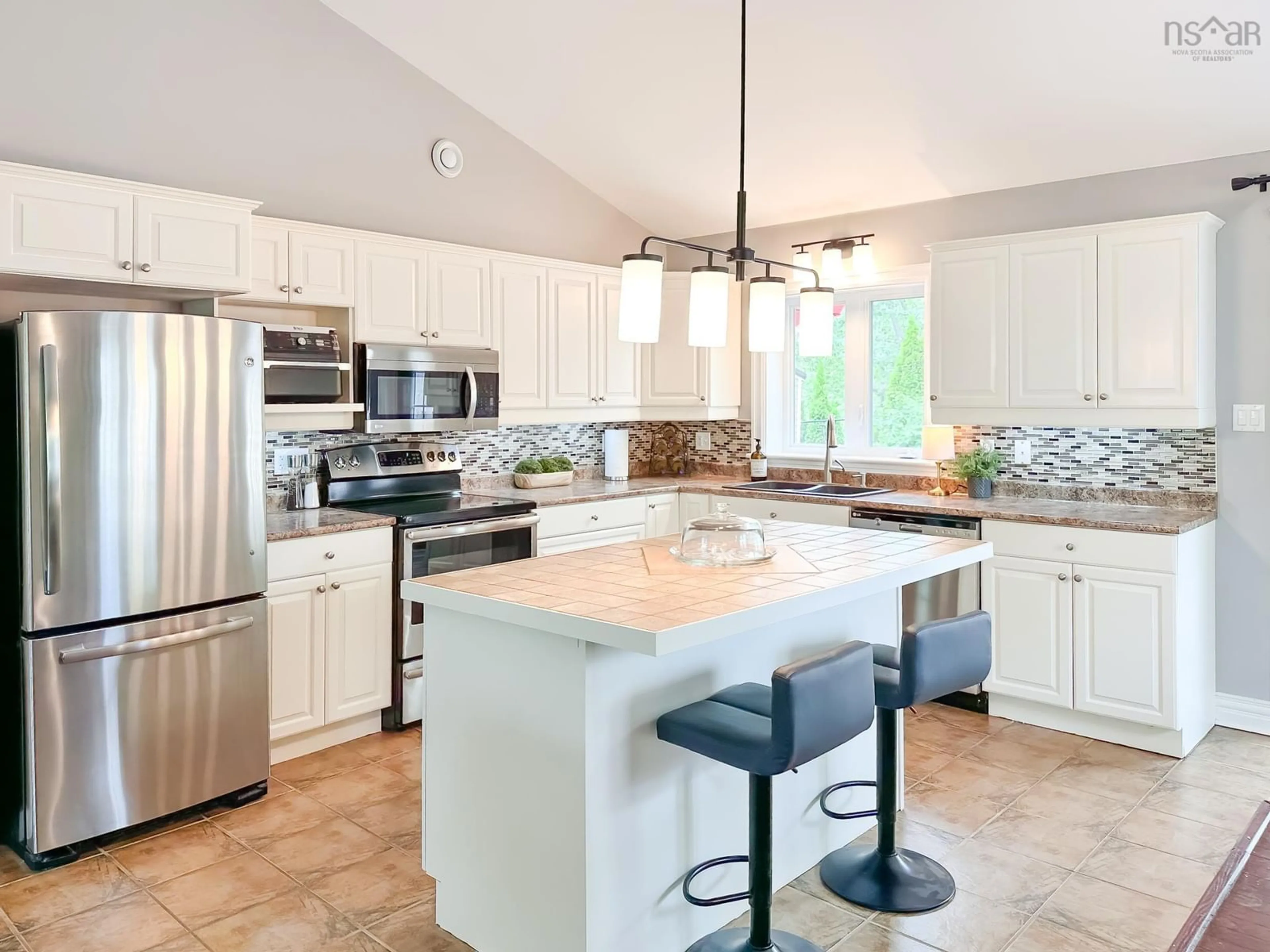 Open concept kitchen, ceramic/tile floor for 1133 Chapel St, Canning Nova Scotia B0P 1H0