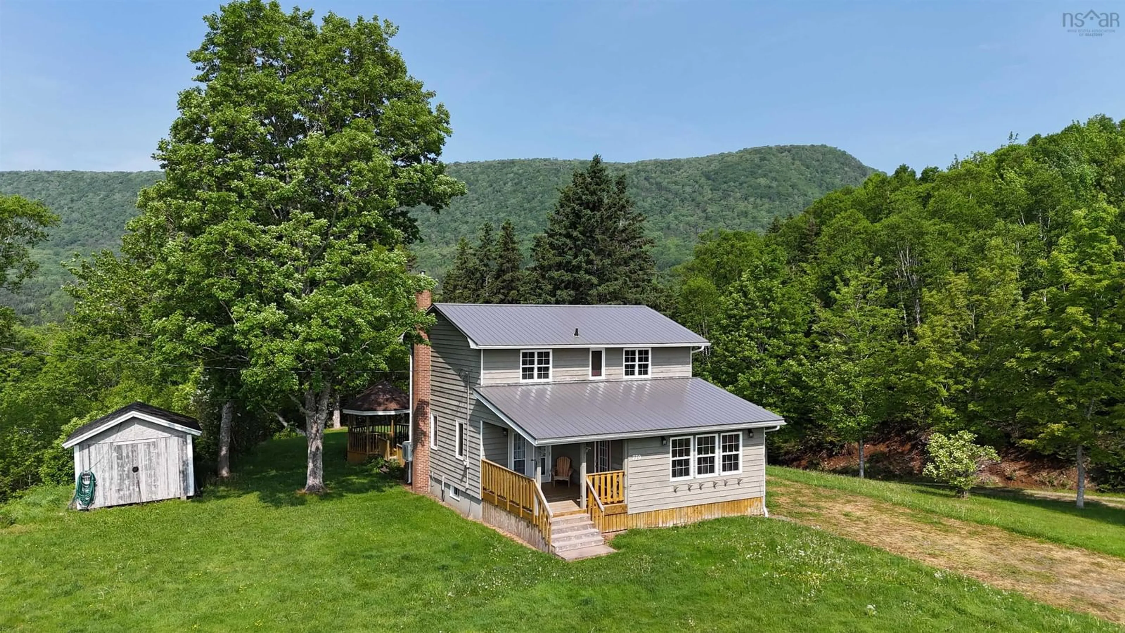 A pic from outside/outdoor area/front of a property/back of a property/a pic from drone, mountain view for 770 Hatchery Rd., Margaree Valley Nova Scotia B0E 2C0