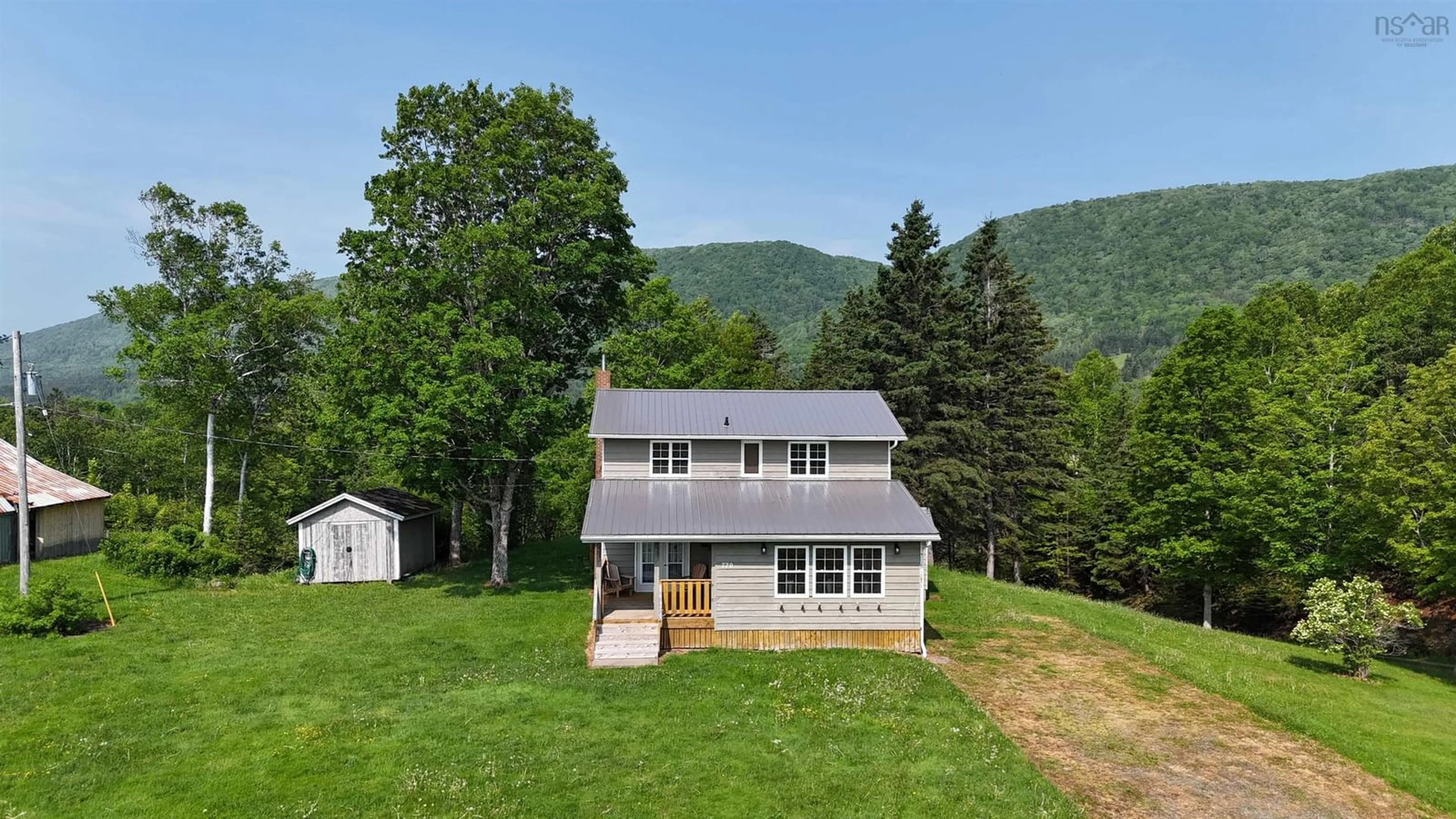 A pic from outside/outdoor area/front of a property/back of a property/a pic from drone, mountain view for 770 Hatchery Rd., Margaree Valley Nova Scotia B0E 2C0