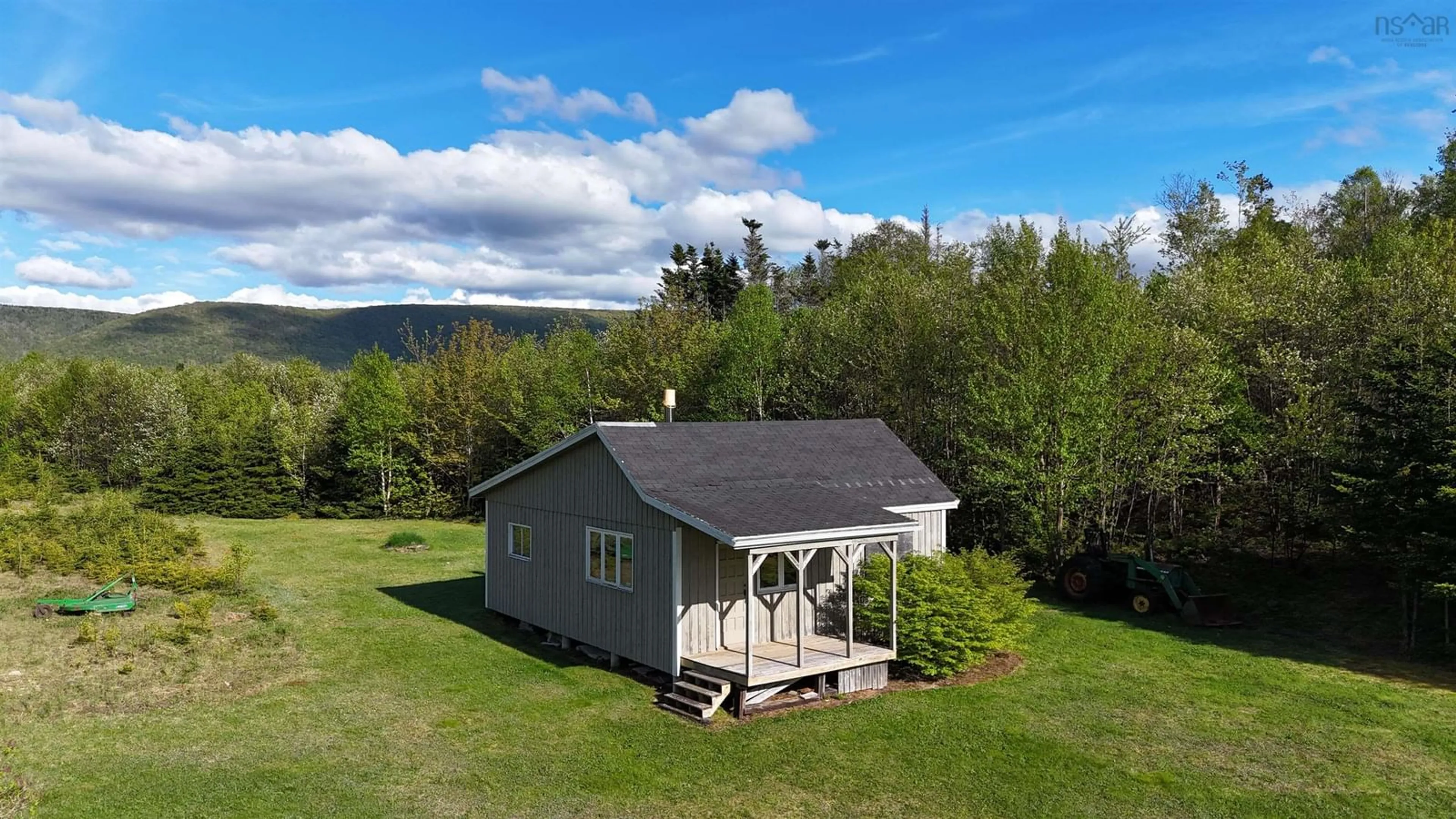 A pic from outside/outdoor area/front of a property/back of a property/a pic from drone, water/lake/river/ocean view for 770 Hatchery Rd., Margaree Valley Nova Scotia B0E 2C0