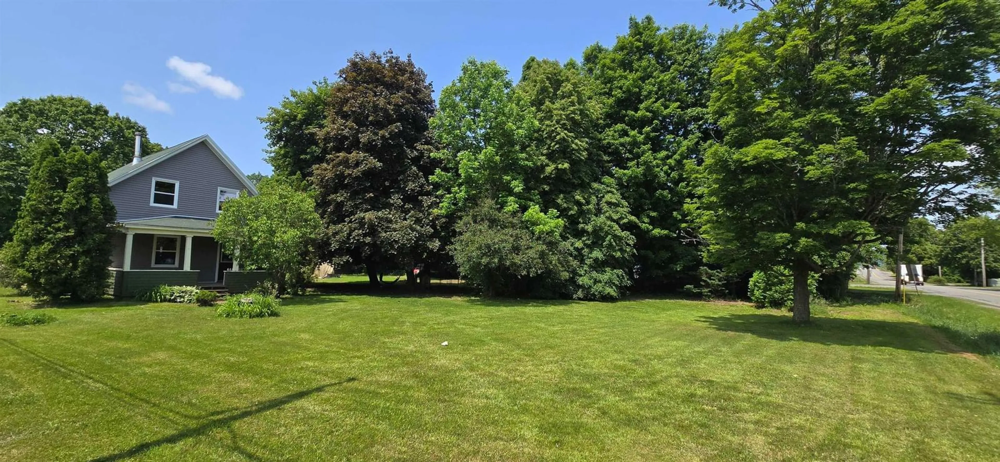 A pic from outside/outdoor area/front of a property/back of a property/a pic from drone, forest/trees view for 1115 Park St, Aylesford Nova Scotia B0P 1C0