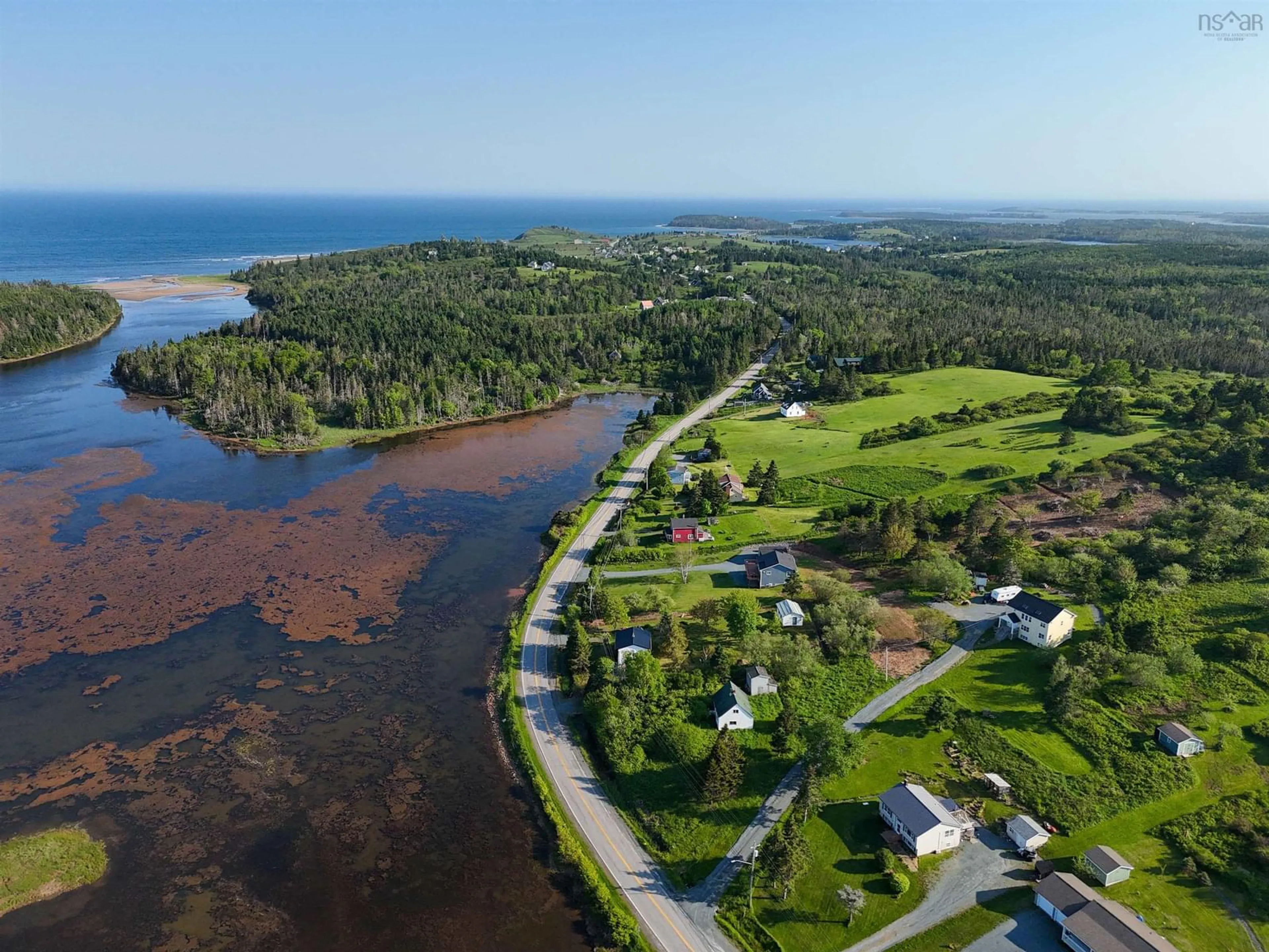 A pic from outside/outdoor area/front of a property/back of a property/a pic from drone, water/lake/river/ocean view for 6447 Highway 207, Grand Desert Nova Scotia B0J 2L0