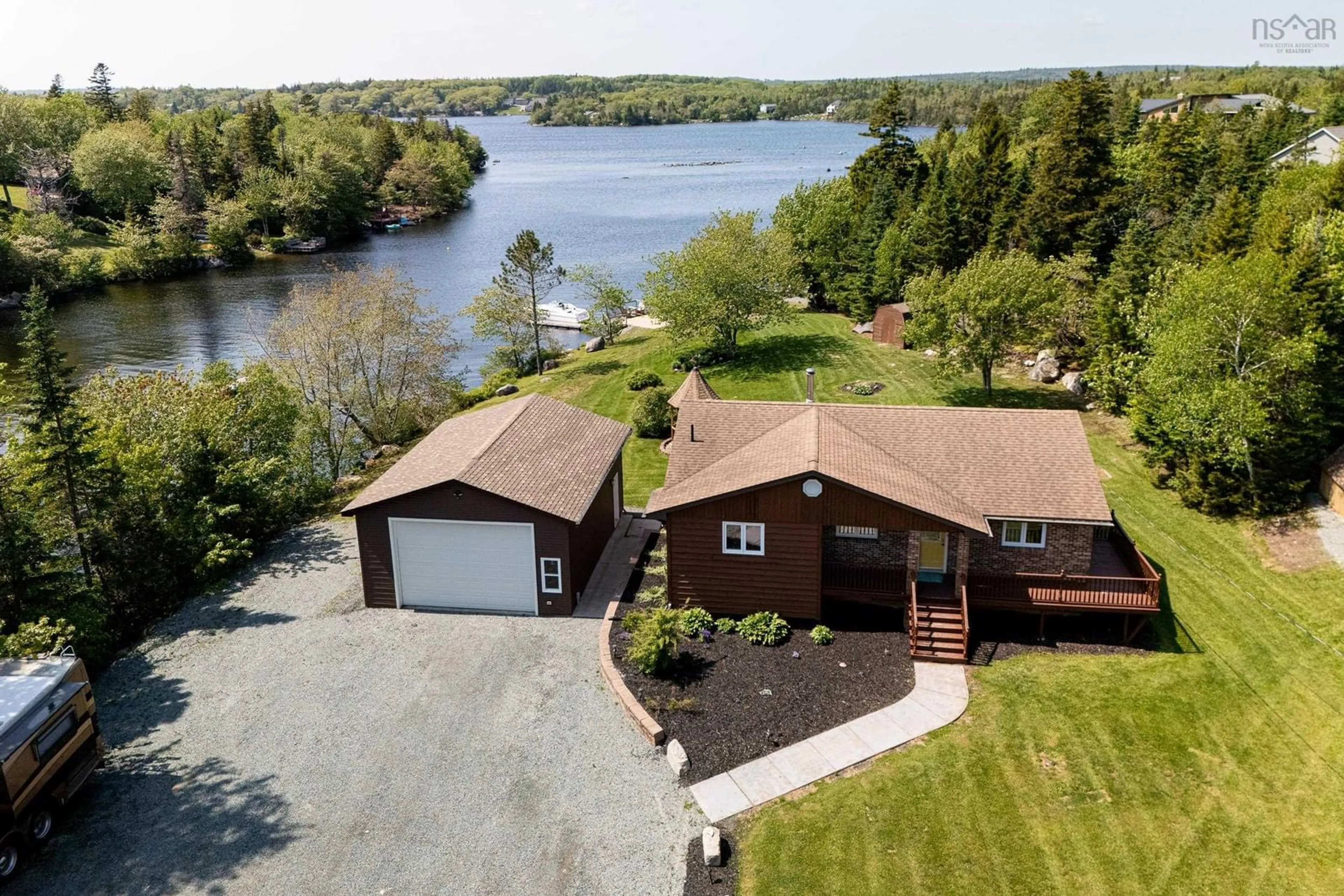 A pic from outside/outdoor area/front of a property/back of a property/a pic from drone, water/lake/river/ocean view for 243 Club Rd, Hatchet Lake Nova Scotia B3T 1R2