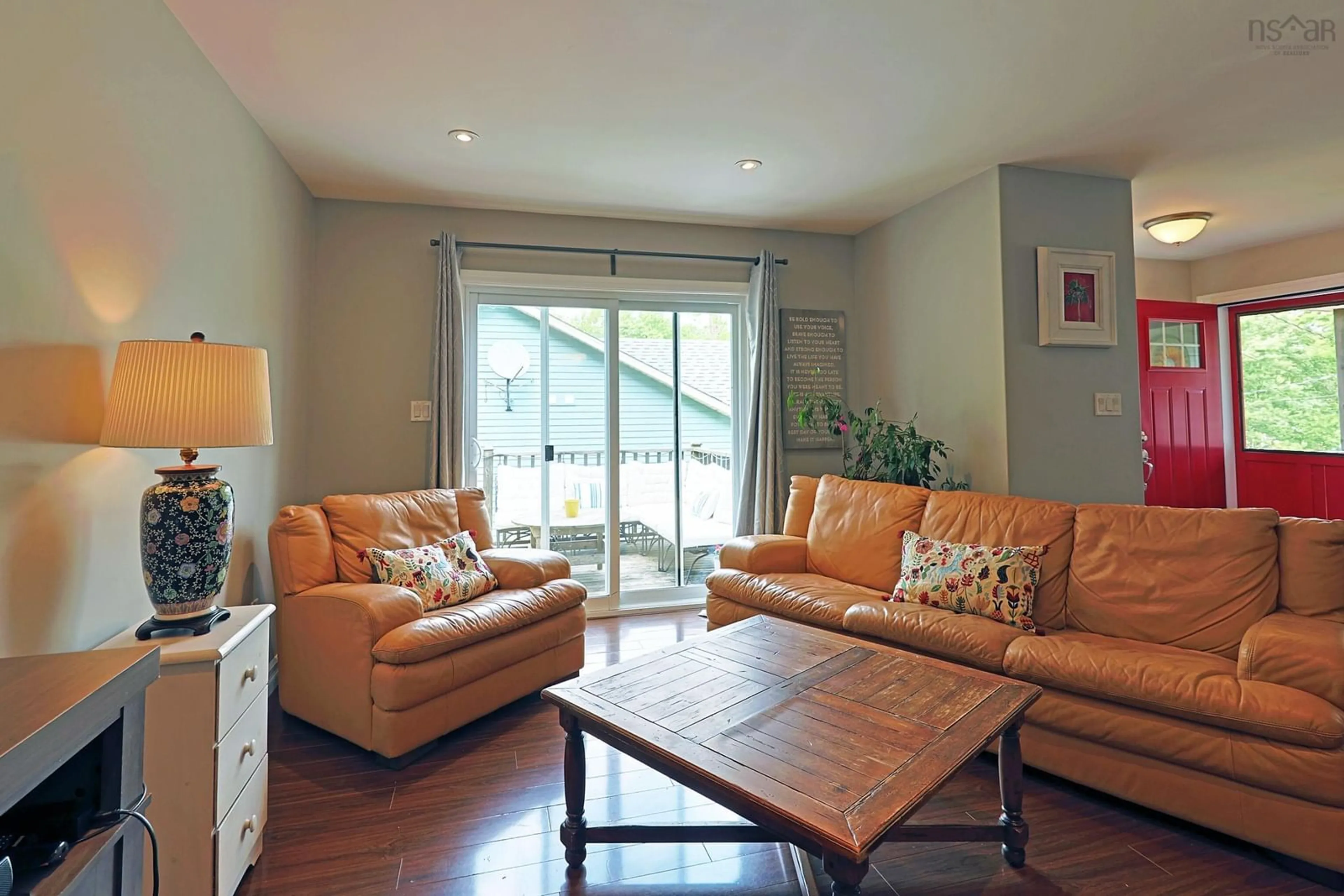 Living room with furniture, wood/laminate floor for 10 Spur St, Mahone Bay Nova Scotia B0J 2E0