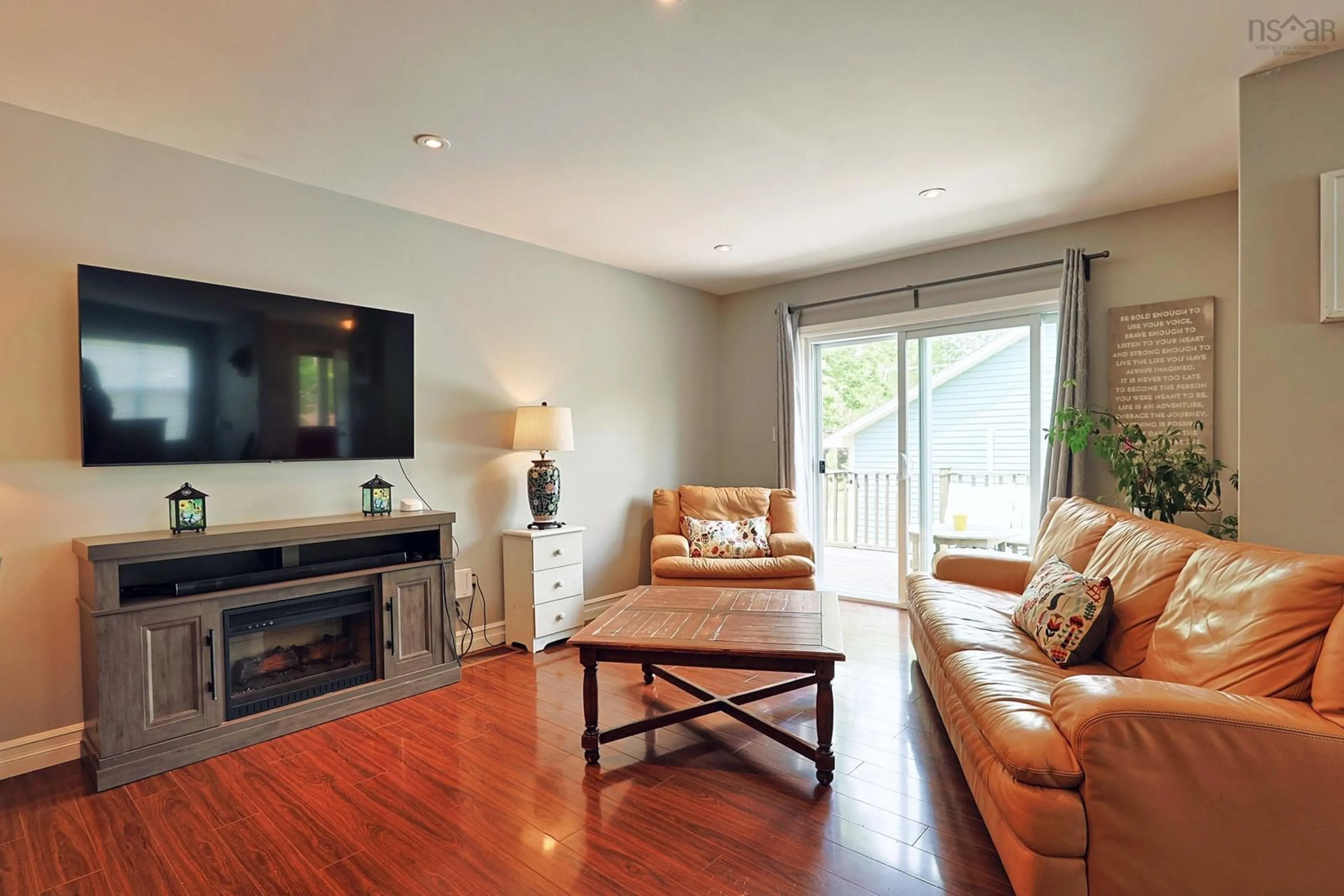 Living room with furniture, wood/laminate floor for 10 Spur St, Mahone Bay Nova Scotia B0J 2E0