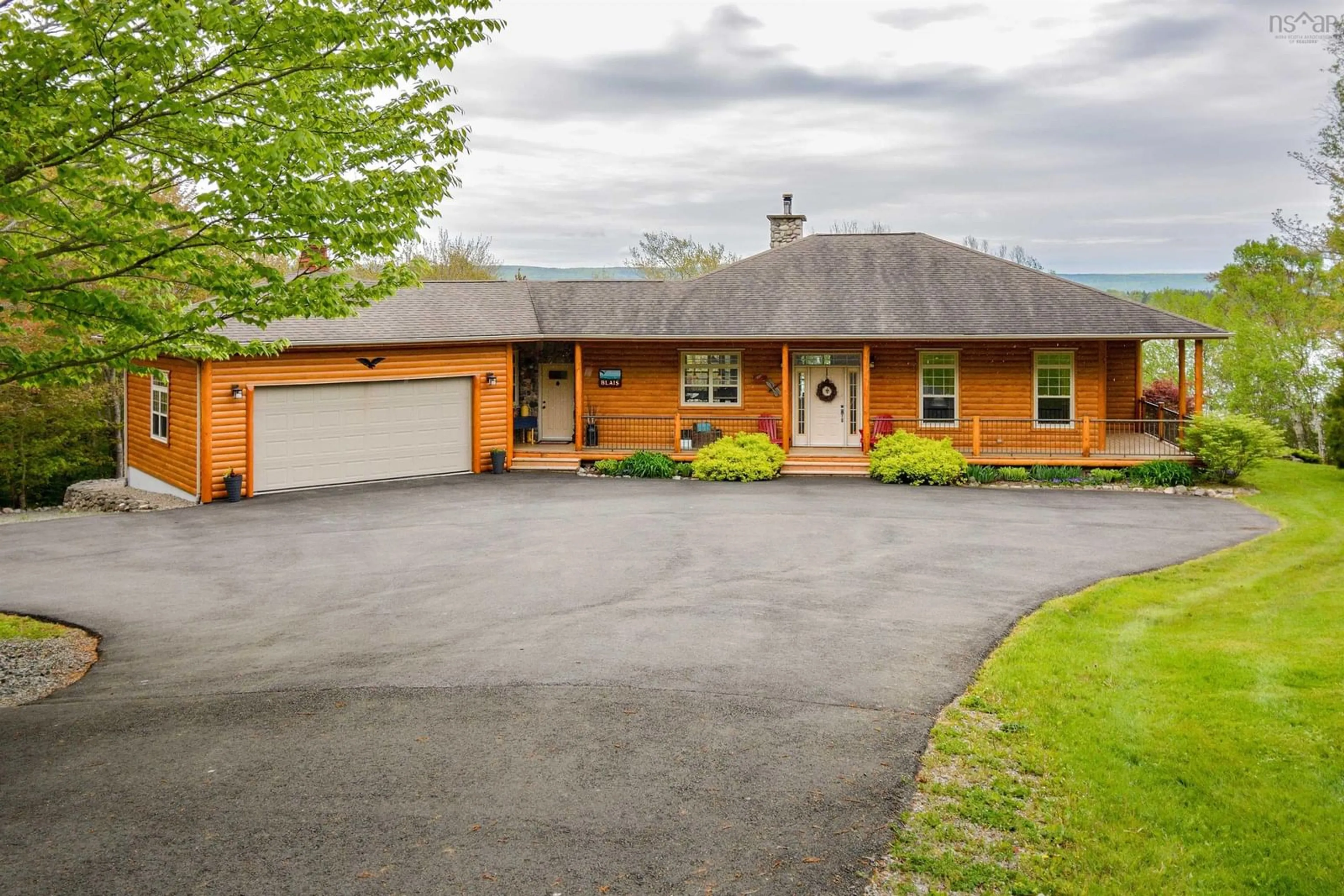 A pic from outside/outdoor area/front of a property/back of a property/a pic from drone, street for 3421 Eskasoni Hwy, Island View Nova Scotia B1J 1K2