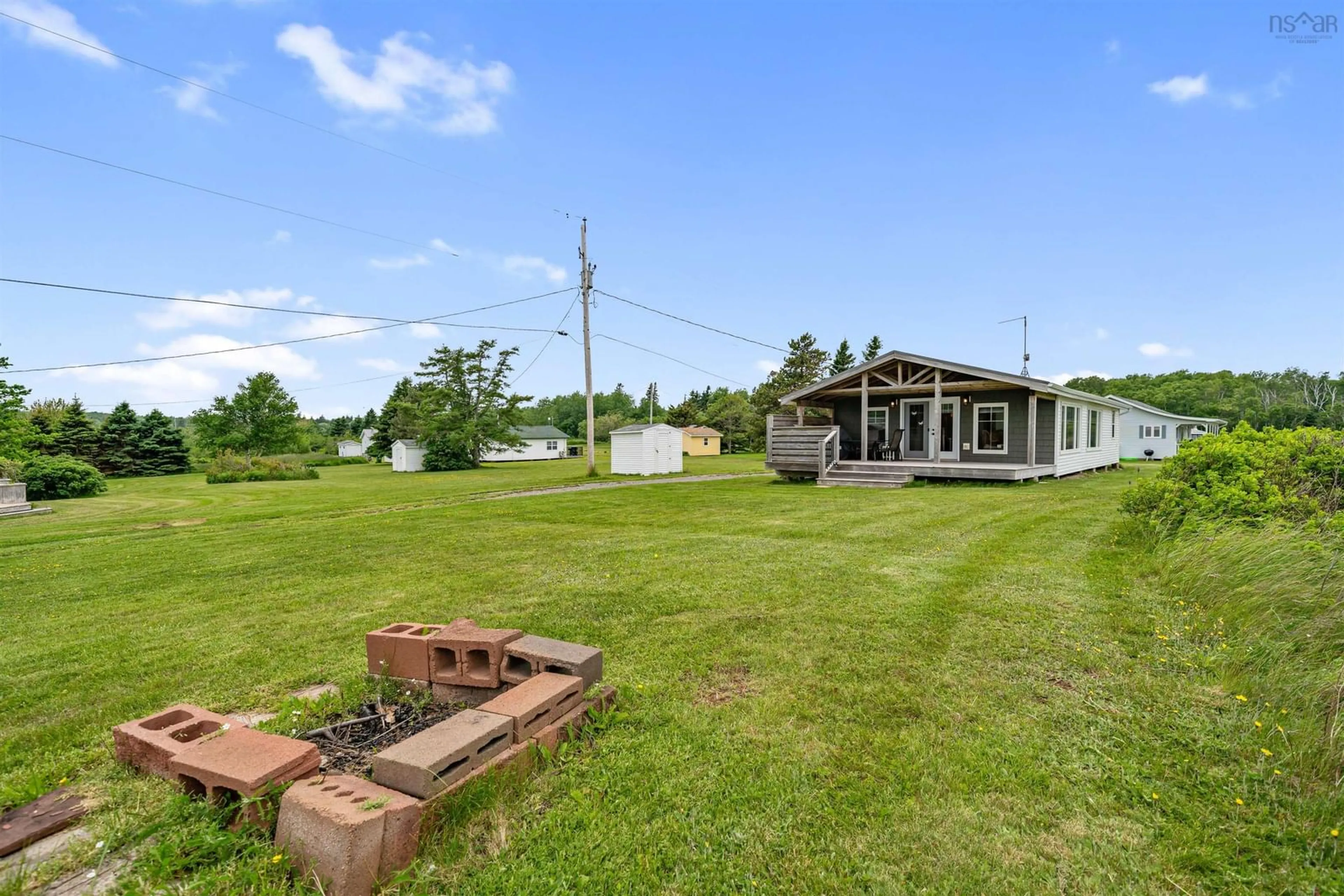 A pic from outside/outdoor area/front of a property/back of a property/a pic from drone, water/lake/river/ocean view for 97 Annabels Beach Lane, Amherst Shore Nova Scotia B0L 1E0