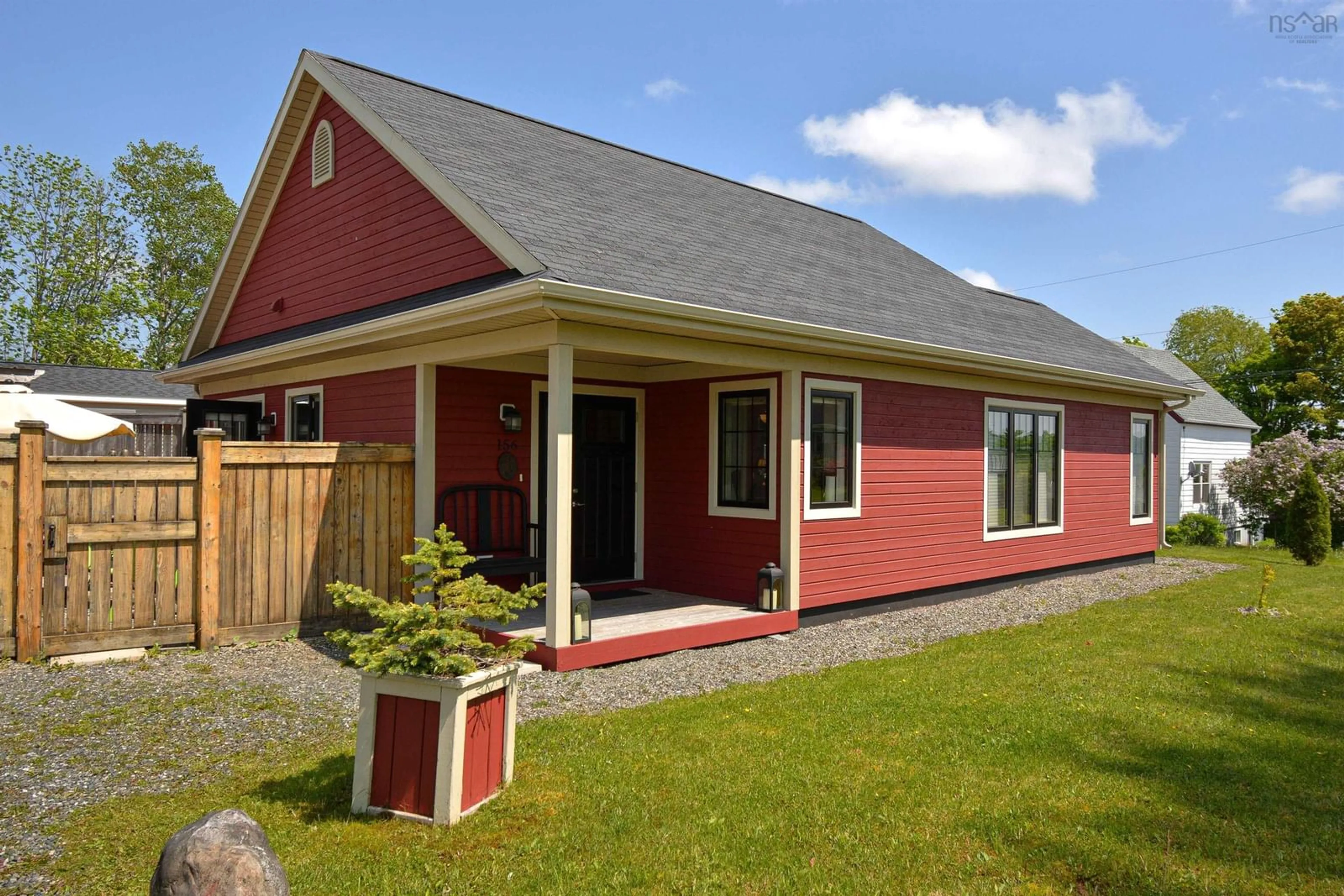 Home with vinyl exterior material, street for 156 Twining St, Baddeck Nova Scotia B0E 1B0