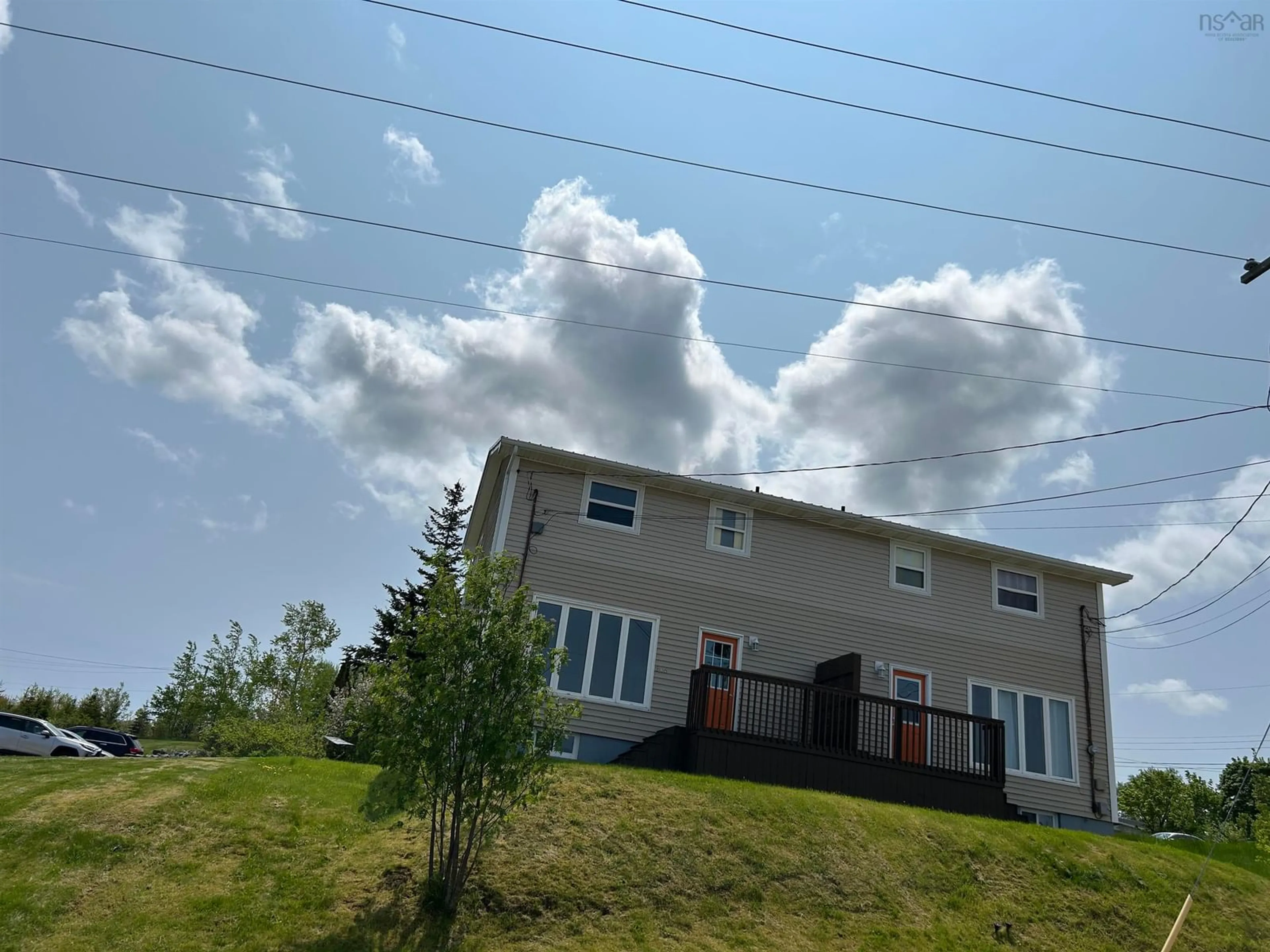 A pic from outside/outdoor area/front of a property/back of a property/a pic from drone, unknown for 304  306 Philpott St #96-1, Port Hawkesbury Nova Scotia B9A 2B8