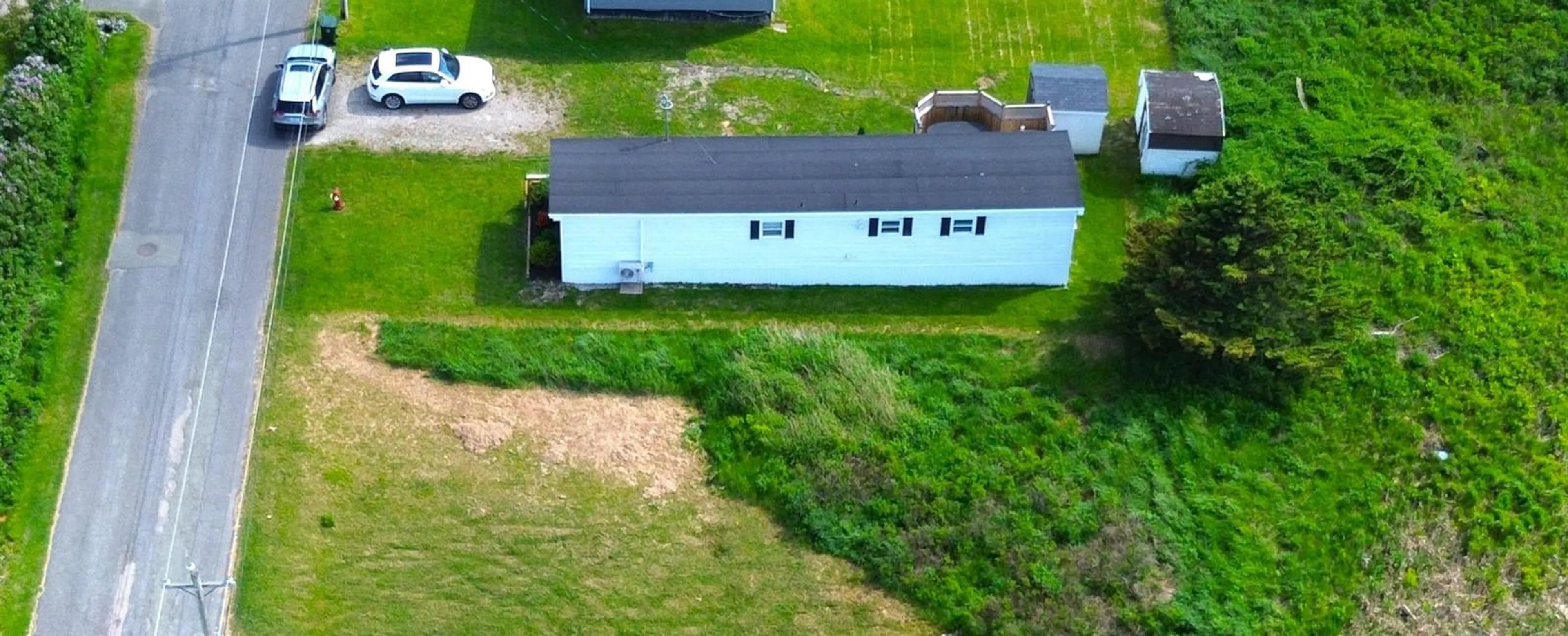 A pic from outside/outdoor area/front of a property/back of a property/a pic from drone, building for 127 Park St, Dominion Nova Scotia B1G 1R7