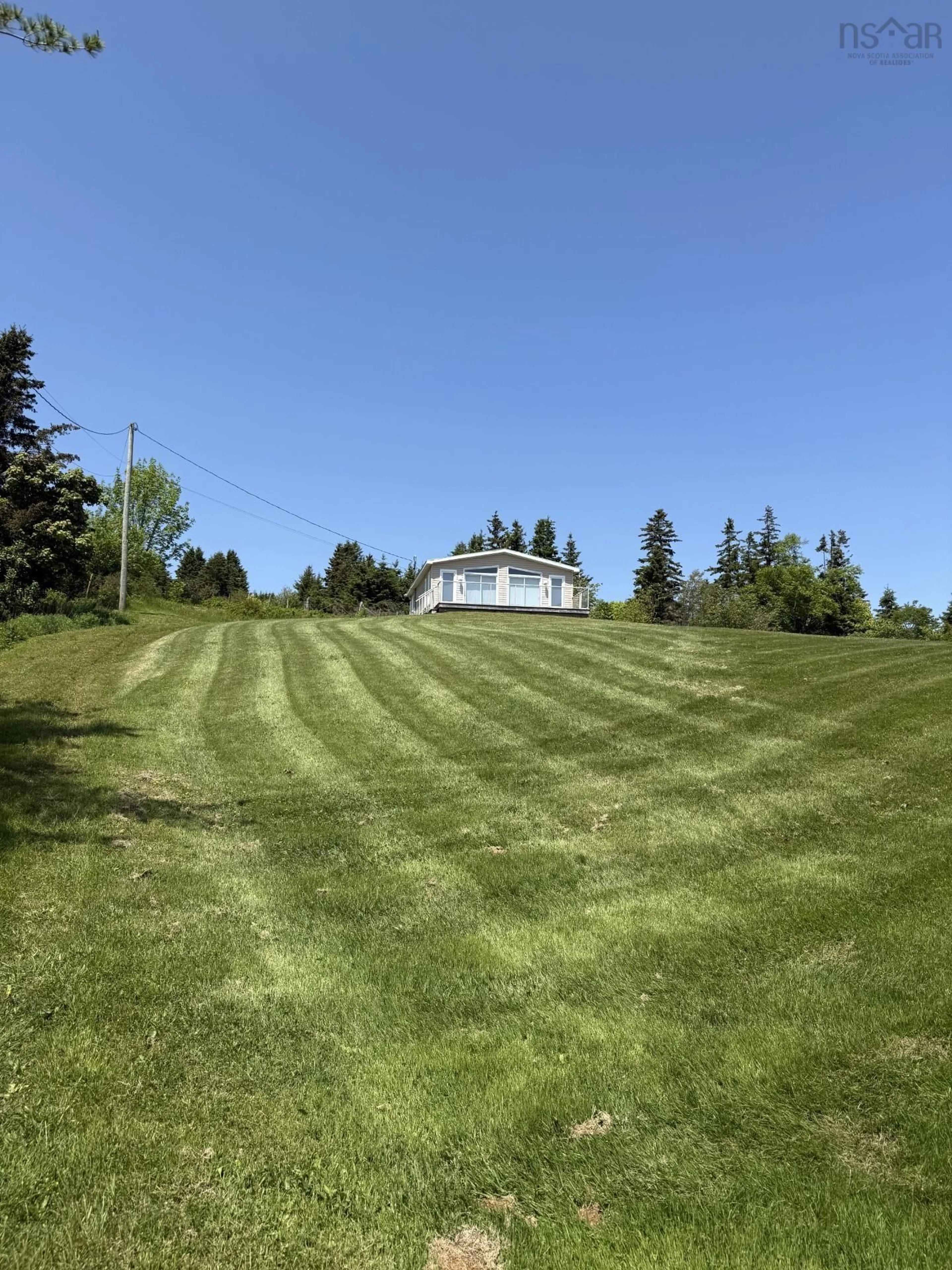 A pic from outside/outdoor area/front of a property/back of a property/a pic from drone, unknown for 5985 Highway 337, Cape George, Ant. N.S., Cape George Nova Scotia B2G 2L2