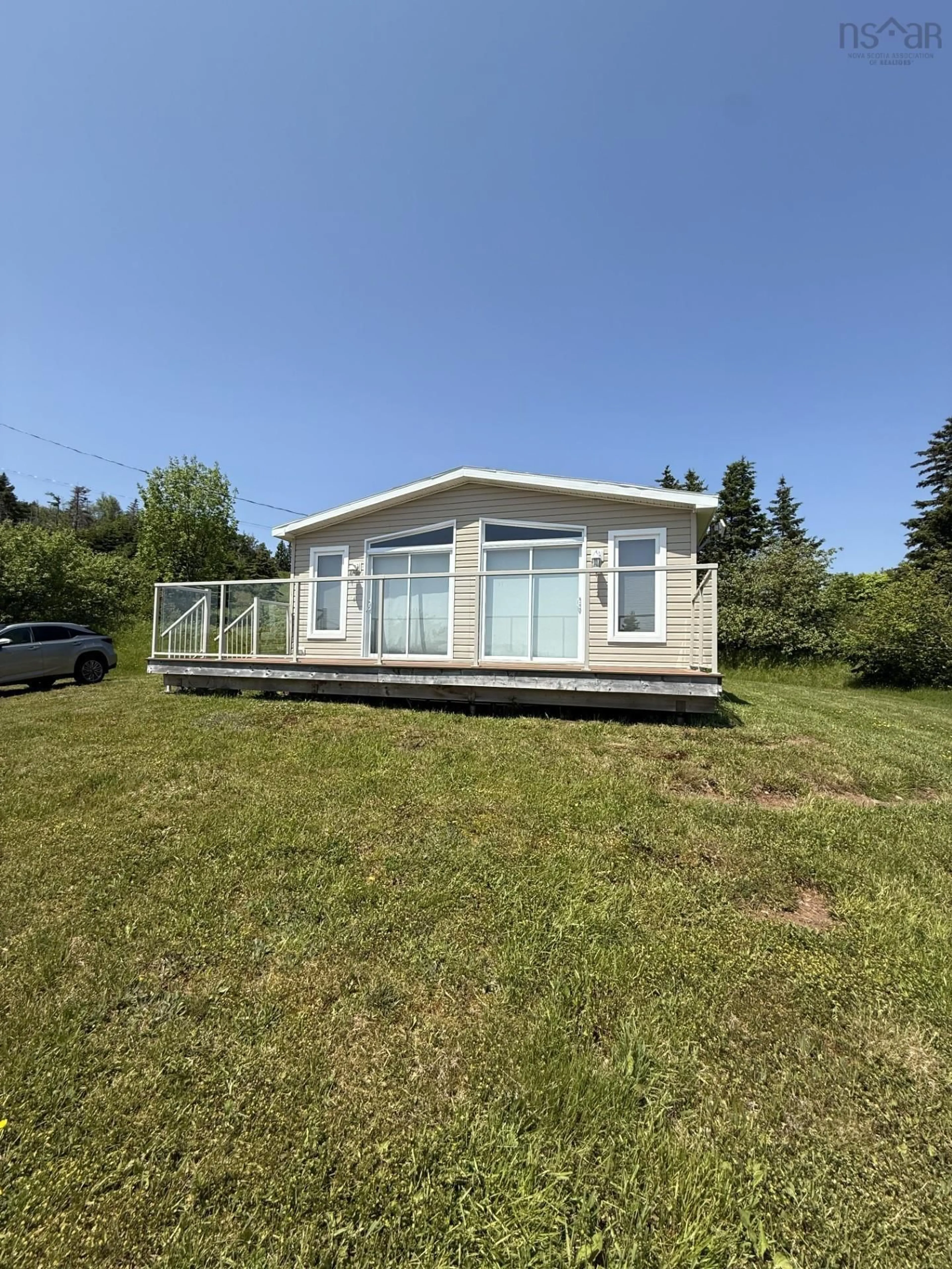 A pic from outside/outdoor area/front of a property/back of a property/a pic from drone, water/lake/river/ocean view for 5985 Highway 337, Cape George, Ant. N.S., Cape George Nova Scotia B2G 2L2