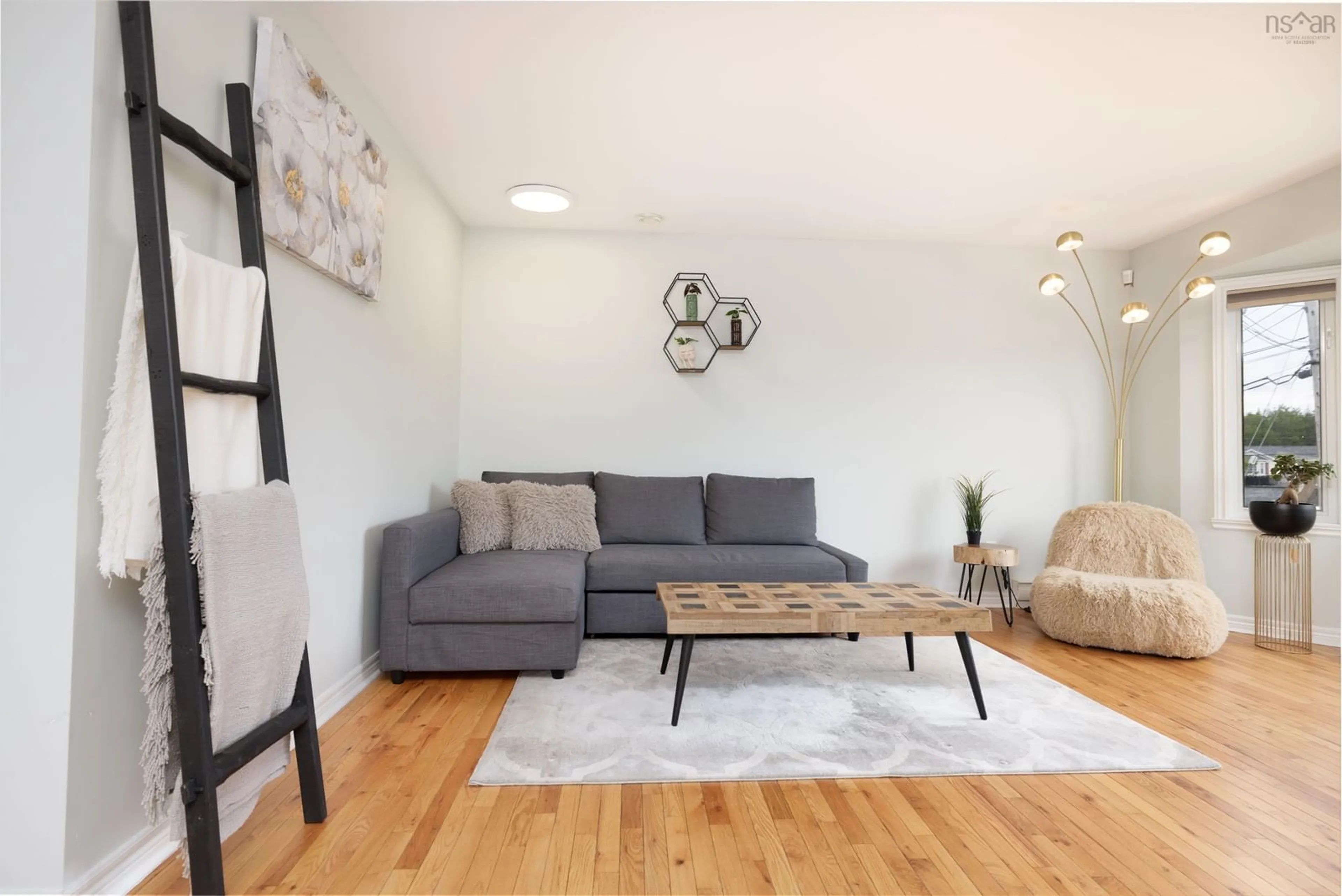 Living room with furniture, wood/laminate floor for 21 Peter Court, Eastern Passage Nova Scotia B3G 1S9