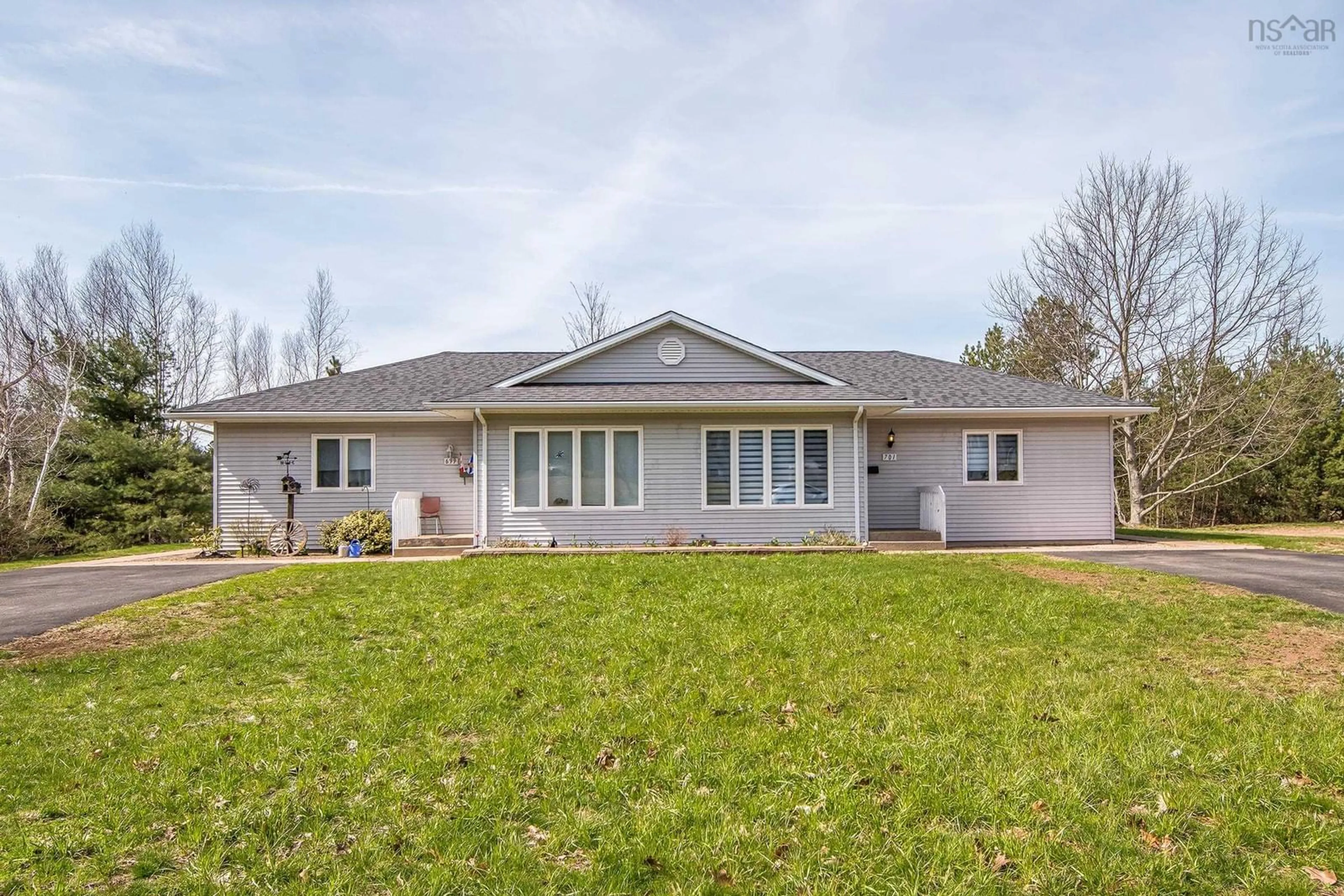 Home with vinyl exterior material, street for 699/701 Balser Dr, Kingston Nova Scotia B0P 1R0