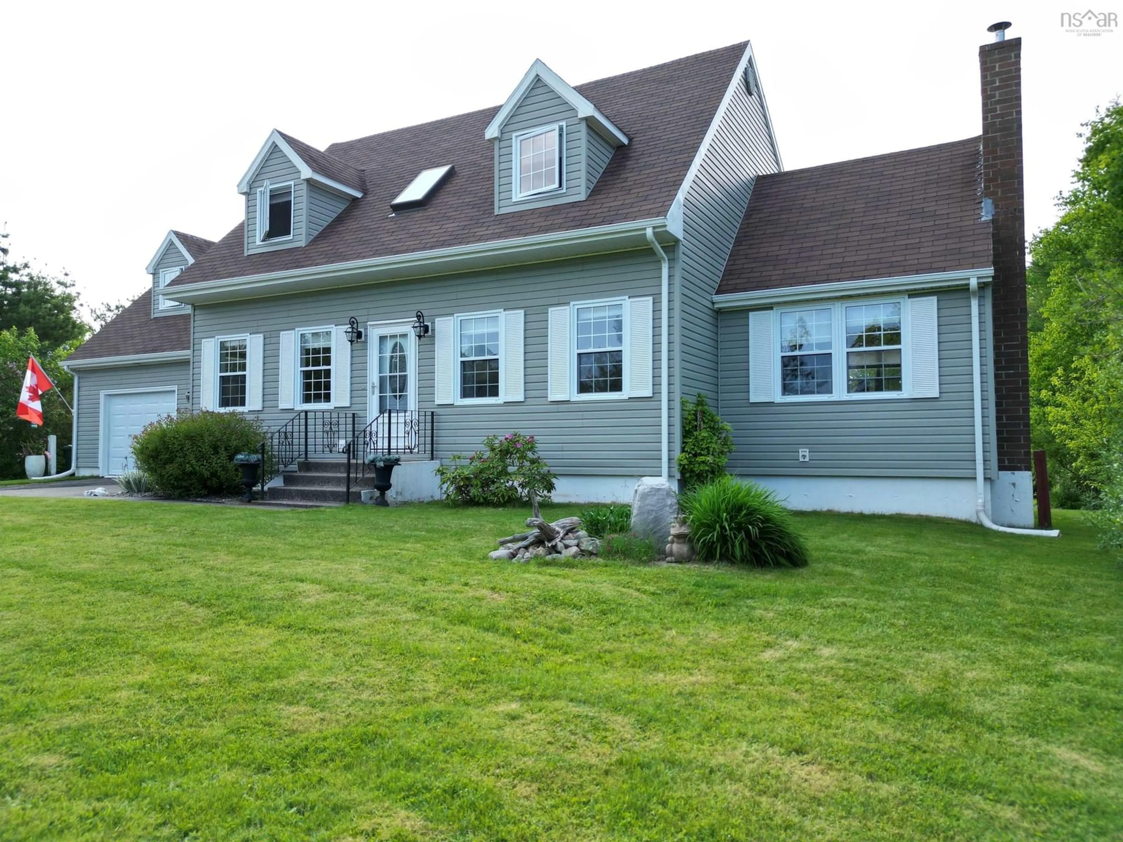 Home with vinyl exterior material, street for 48 Collier Avenue, Coxheath Nova Scotia B1R 2G3