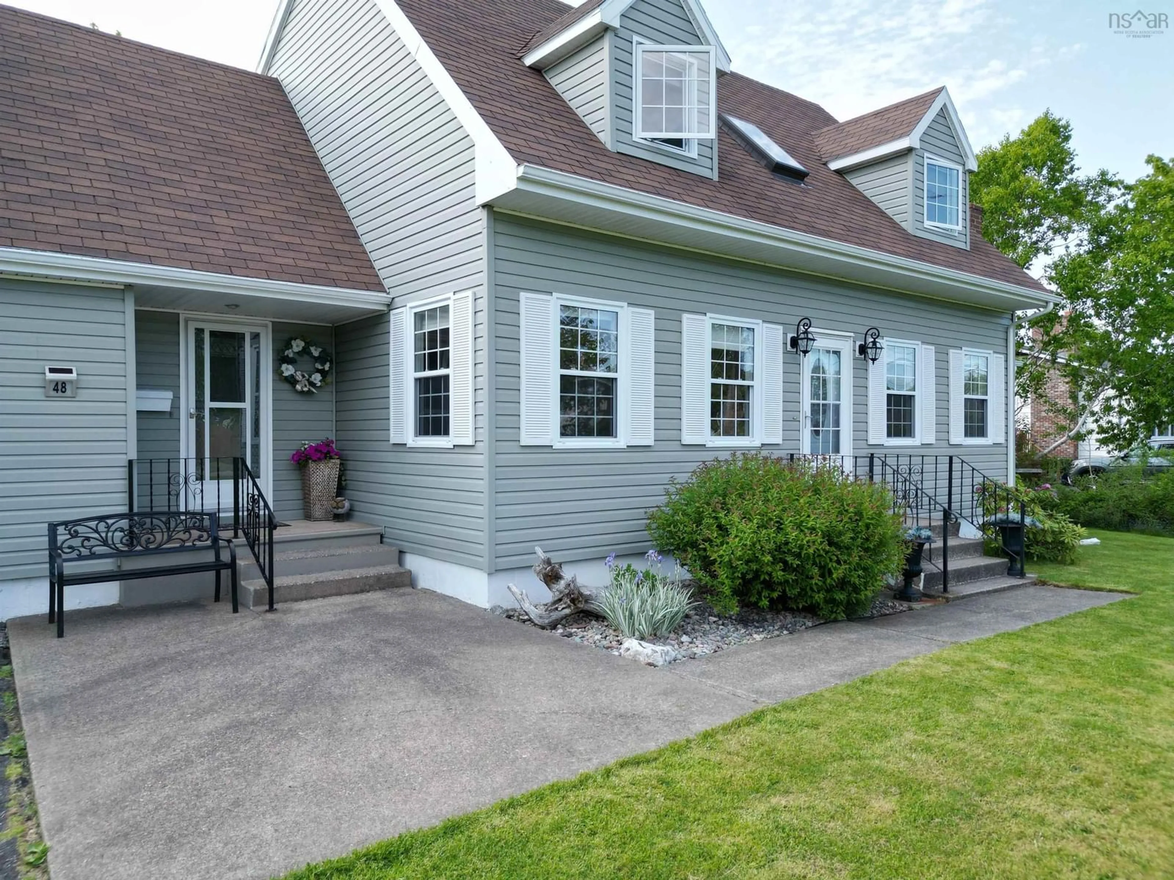 Home with vinyl exterior material, street for 48 Collier Avenue, Coxheath Nova Scotia B1R 2G3