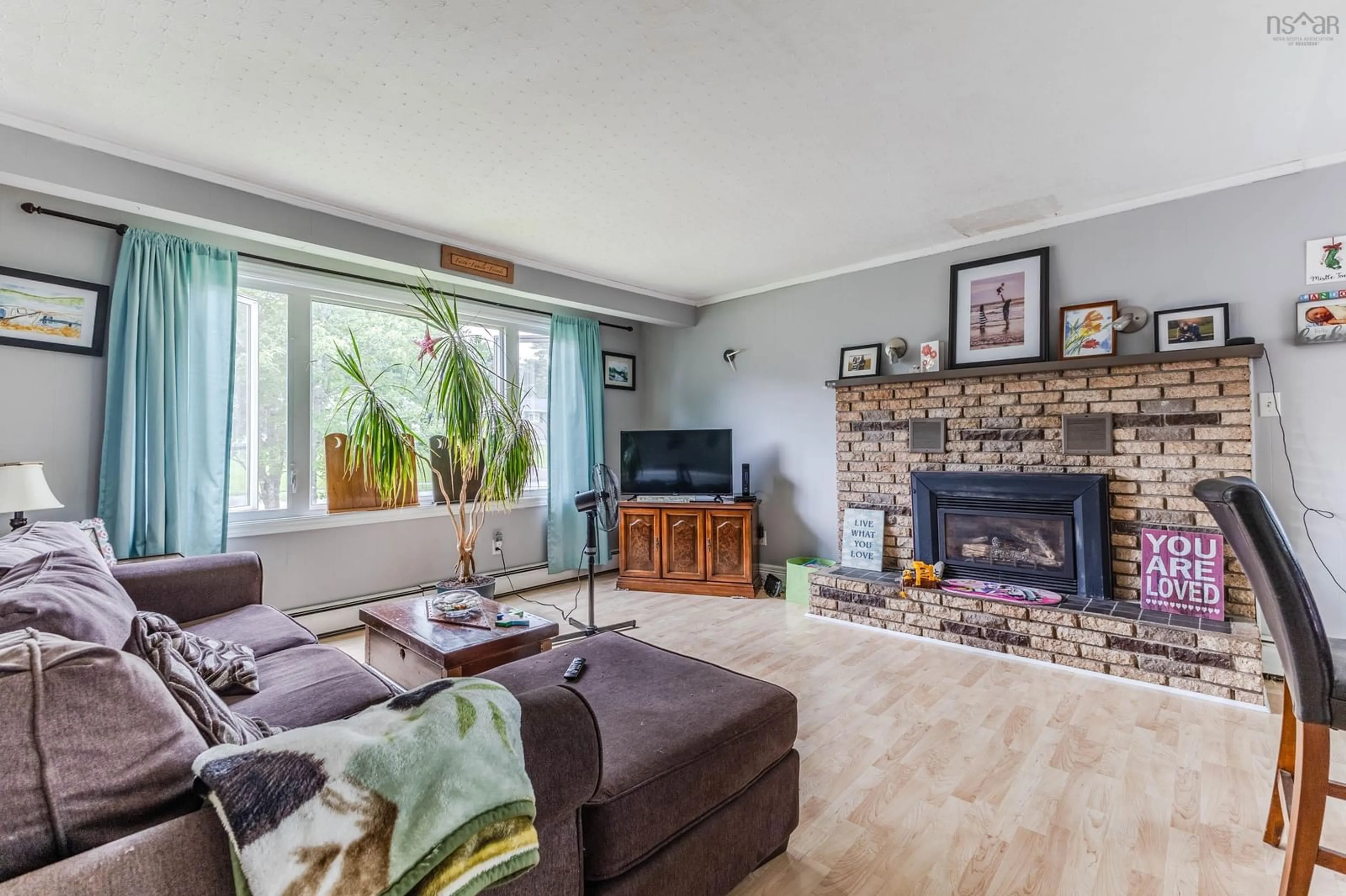 Living room with furniture, wood/laminate floor for 43 Scenic Dr, Bible Hill Nova Scotia B2N 5N9