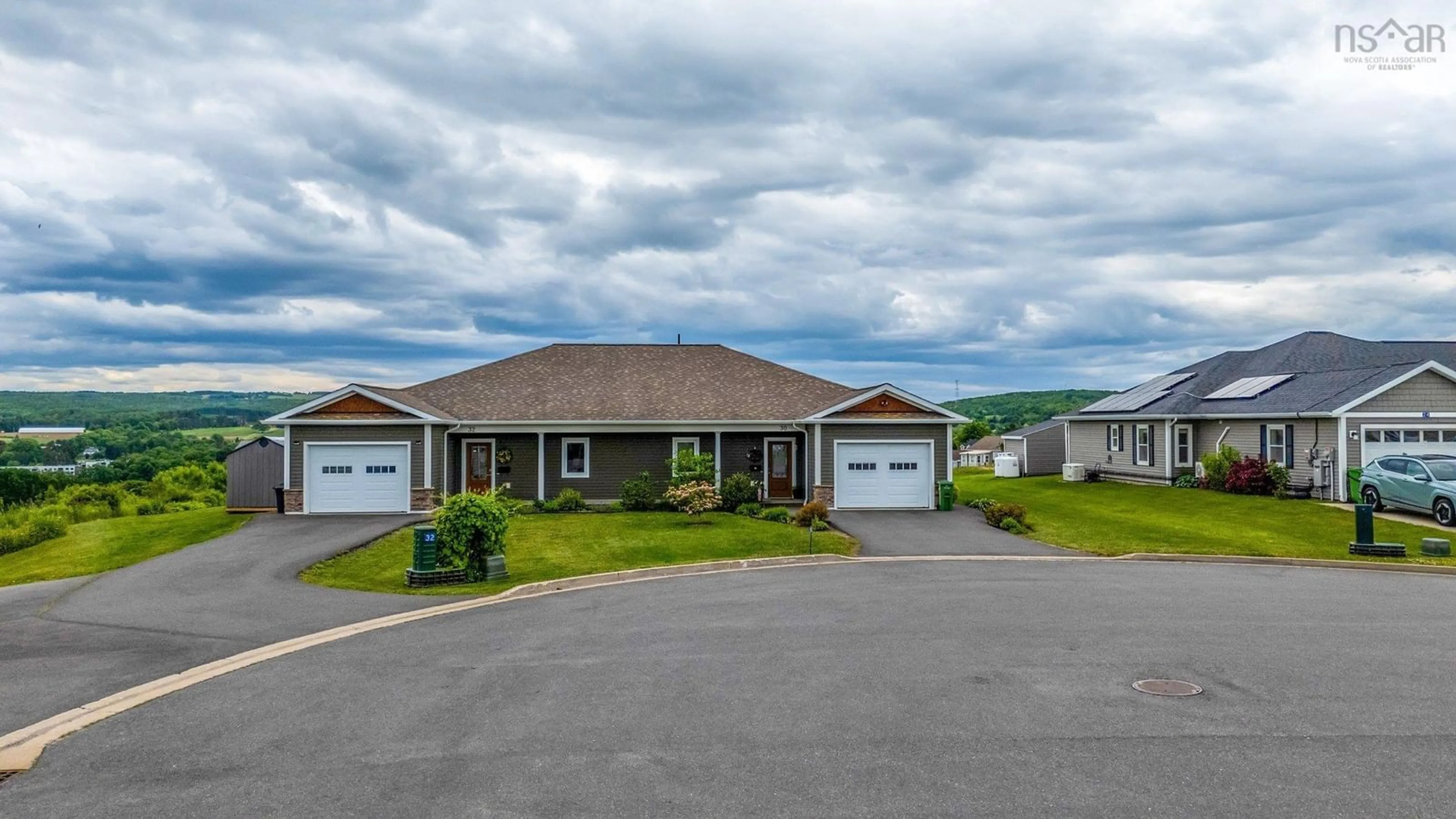 A pic from outside/outdoor area/front of a property/back of a property/a pic from drone, unknown for 32 Mackinnon Crt, Kentville Nova Scotia B4N 5R2