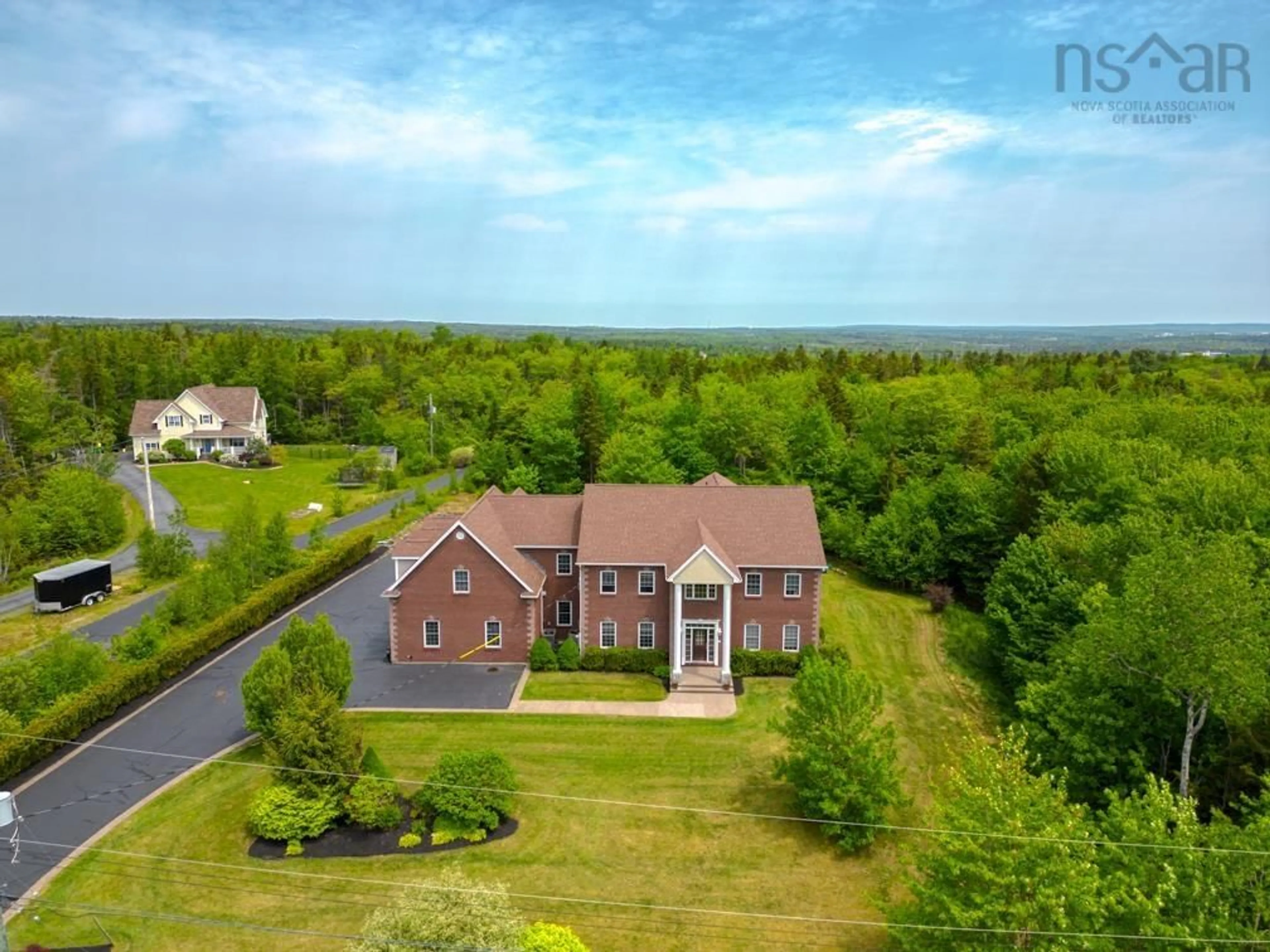 A pic from outside/outdoor area/front of a property/back of a property/a pic from drone, water/lake/river/ocean view for 42 Vrege Crt, Hammonds Plains Nova Scotia B4B 1K2