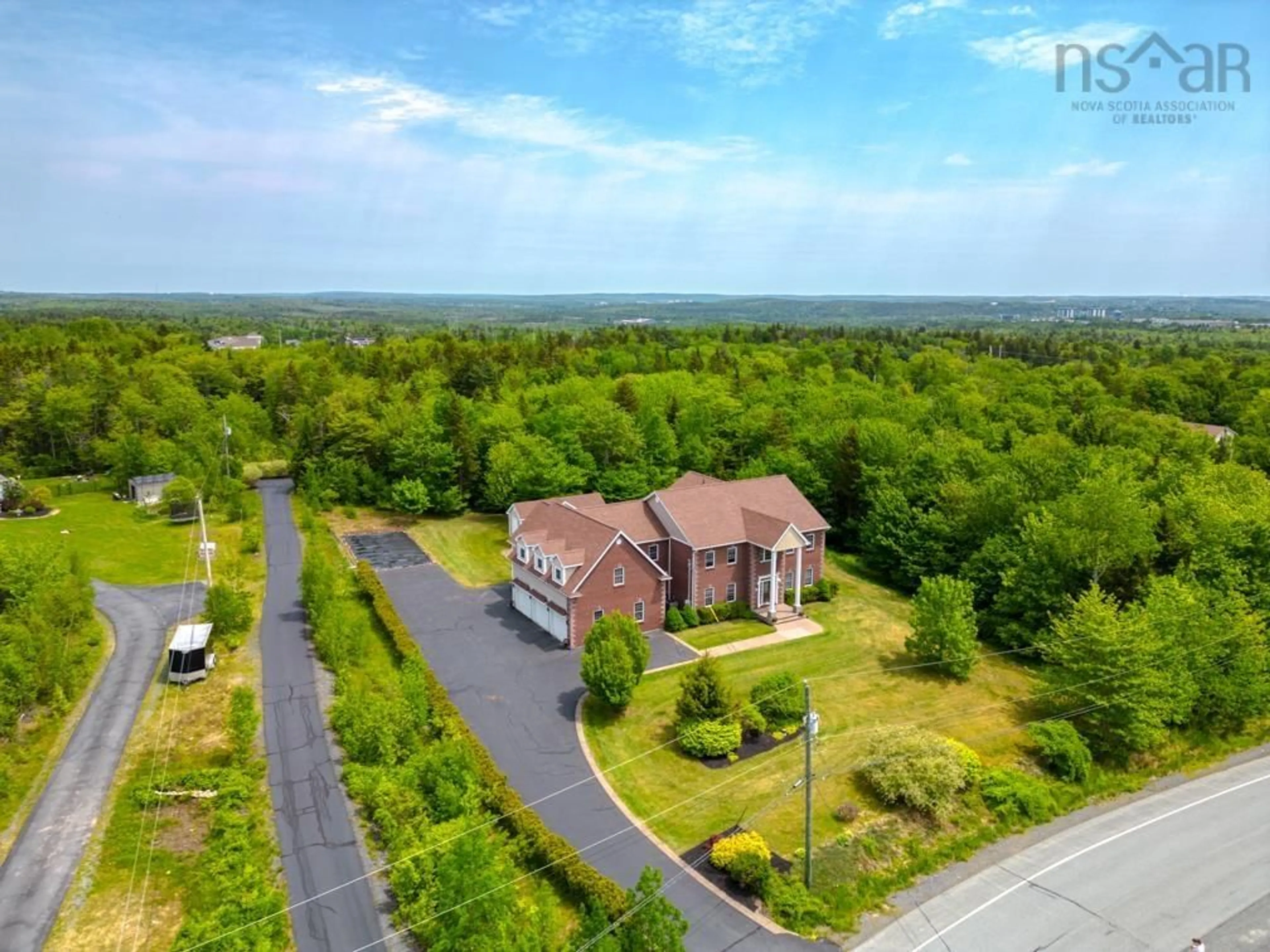 A pic from outside/outdoor area/front of a property/back of a property/a pic from drone, unknown for 42 Vrege Crt, Hammonds Plains Nova Scotia B4B 1K2