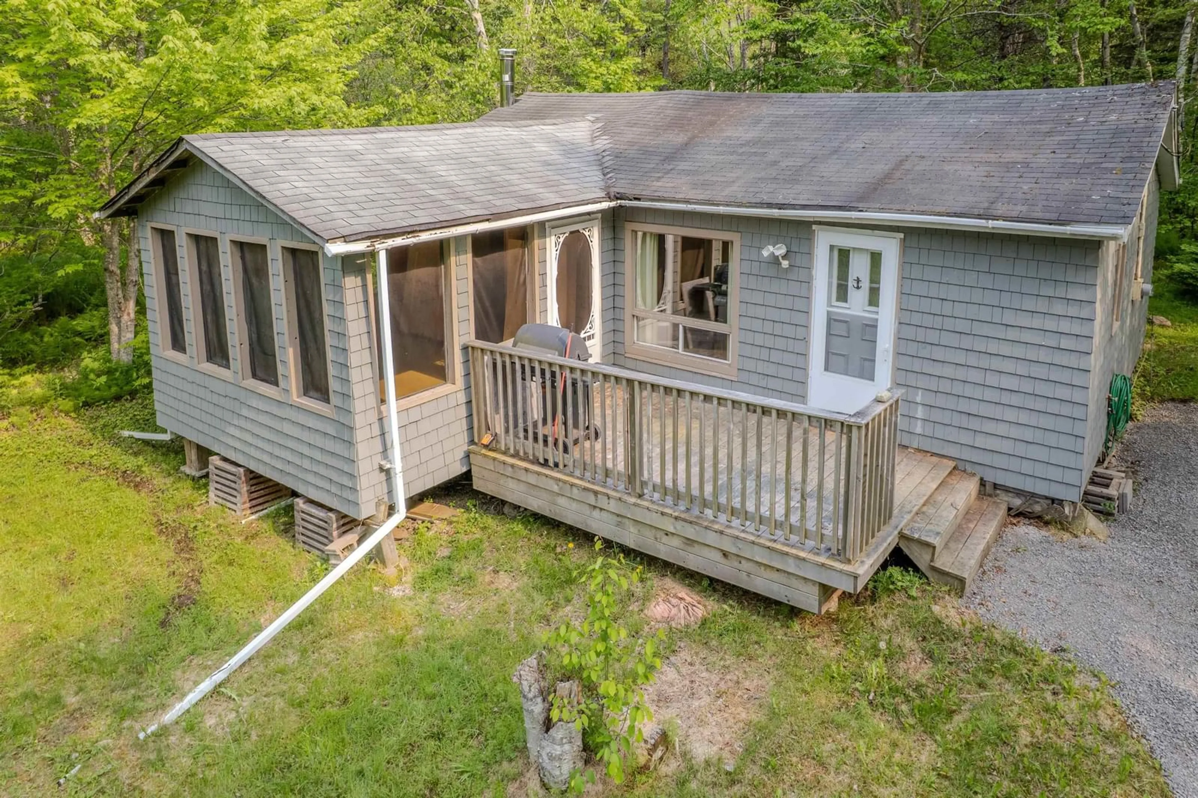 A pic from outside/outdoor area/front of a property/back of a property/a pic from drone, unknown for 58 Macisaac Lane, Big Pond Nova Scotia B1J 1S7