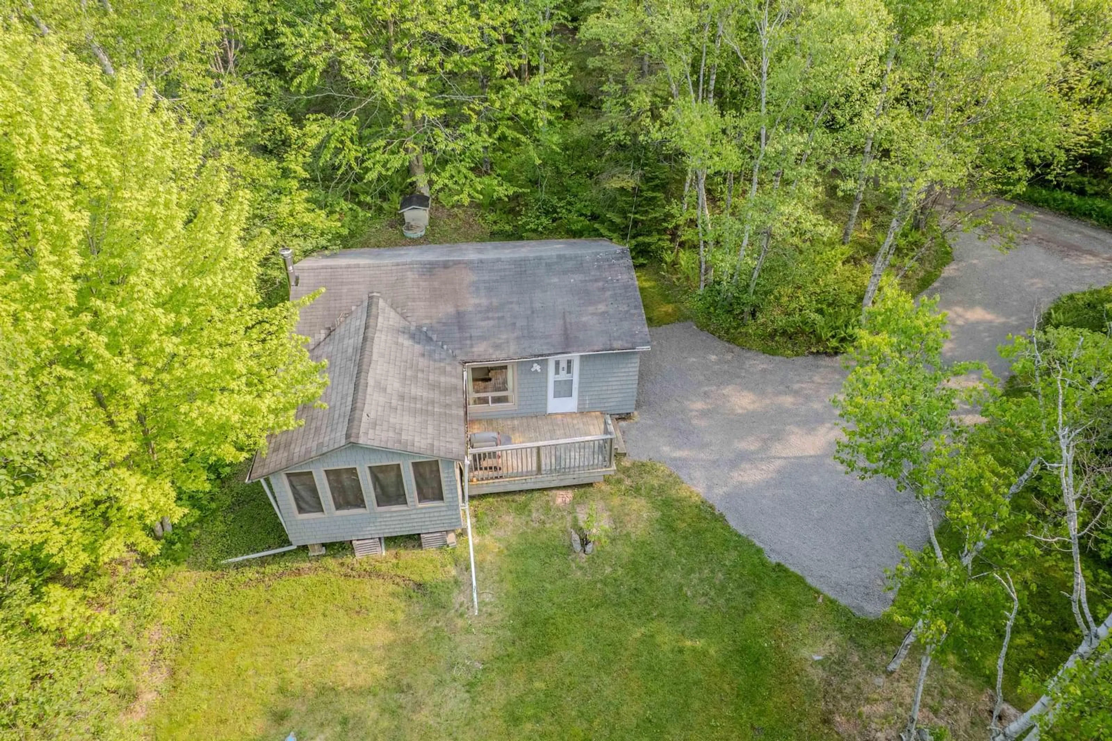 A pic from outside/outdoor area/front of a property/back of a property/a pic from drone, unknown for 58 Macisaac Lane, Big Pond Nova Scotia B1J 1S7