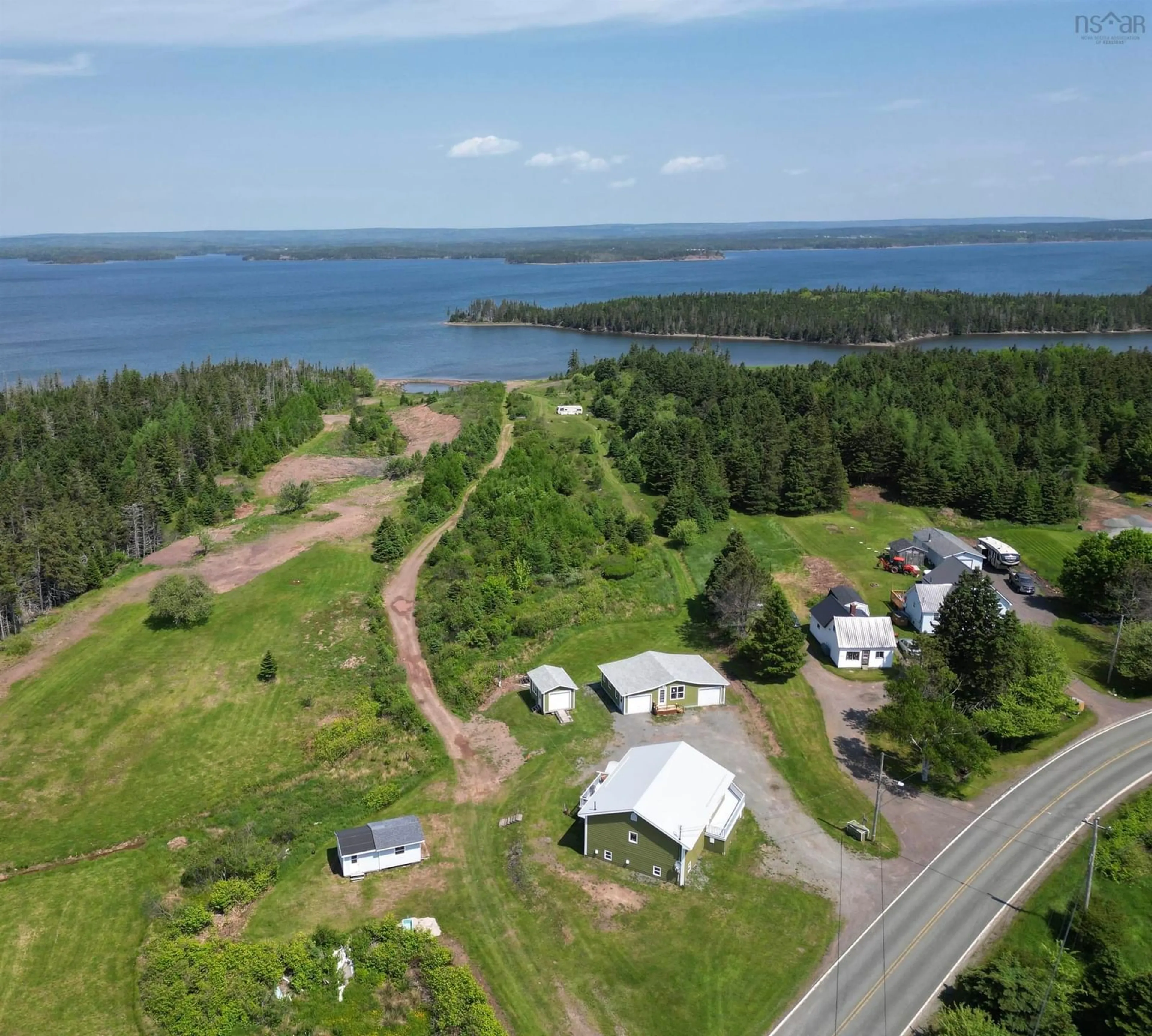 A pic from outside/outdoor area/front of a property/back of a property/a pic from drone, water/lake/river/ocean view for 3123 Highway 320, D'Escousse Nova Scotia B0E 1K0