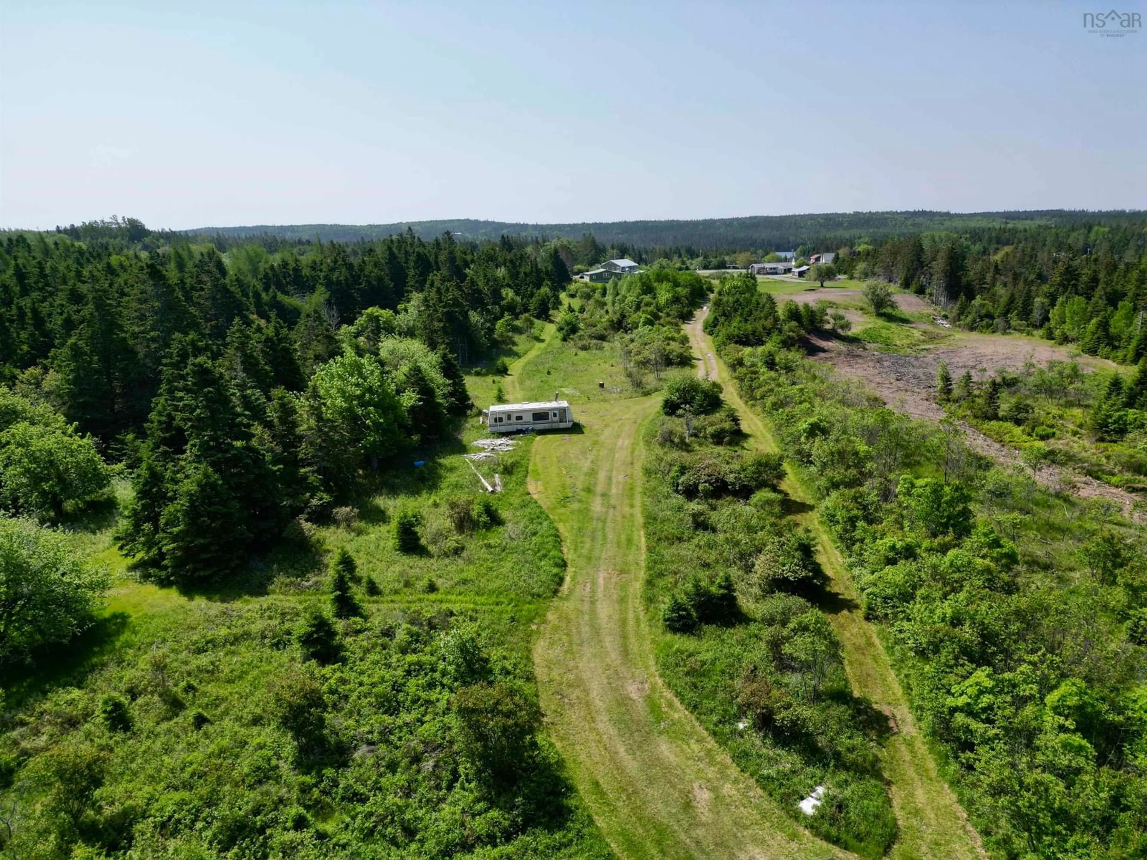 A pic from outside/outdoor area/front of a property/back of a property/a pic from drone, forest/trees view for 3123 Highway 320, D'Escousse Nova Scotia B0E 1K0