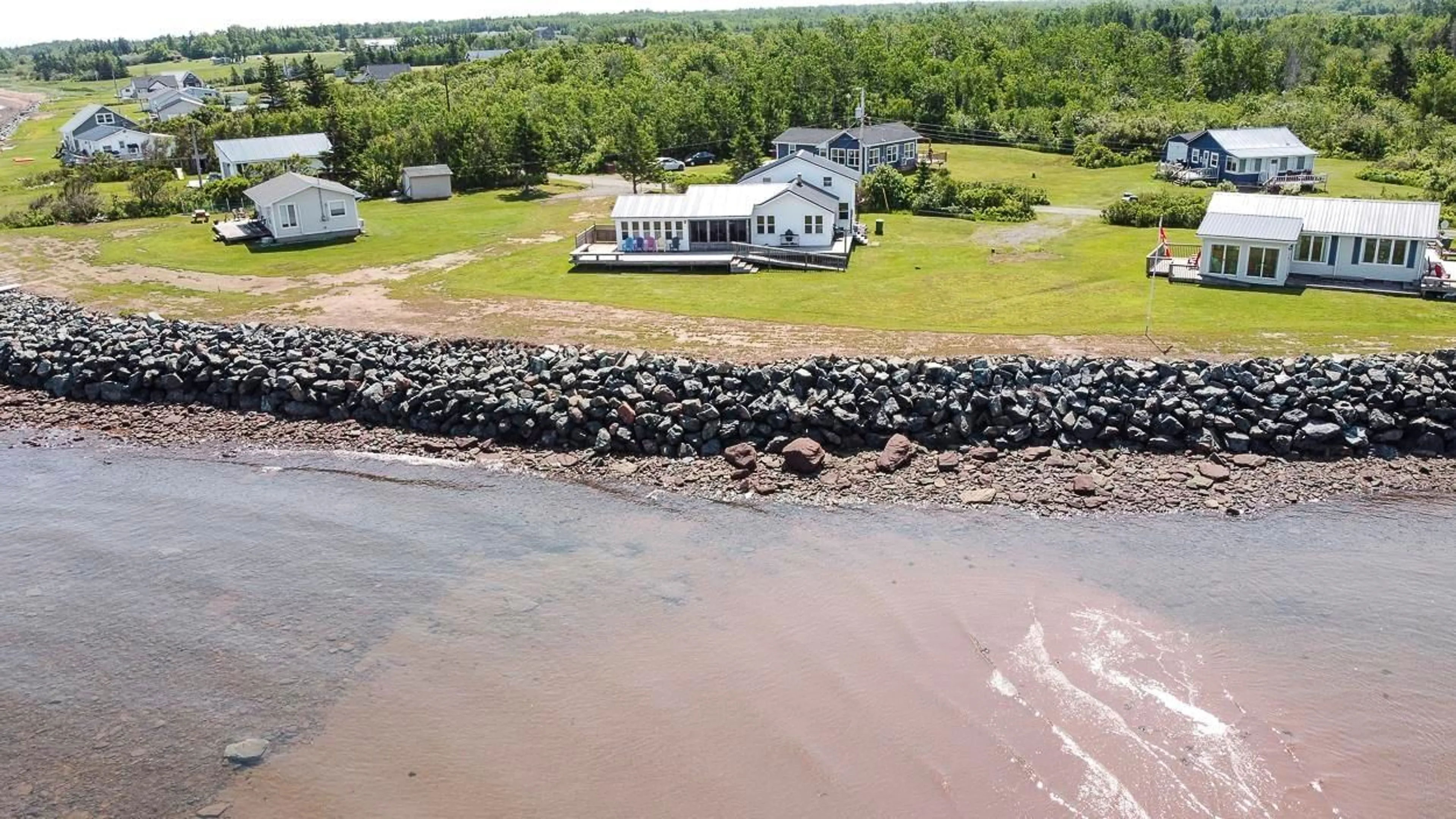 A pic from outside/outdoor area/front of a property/back of a property/a pic from drone, water/lake/river/ocean view for 150 Mathesons Cove Rd, Pugwash Nova Scotia B0K 1L0