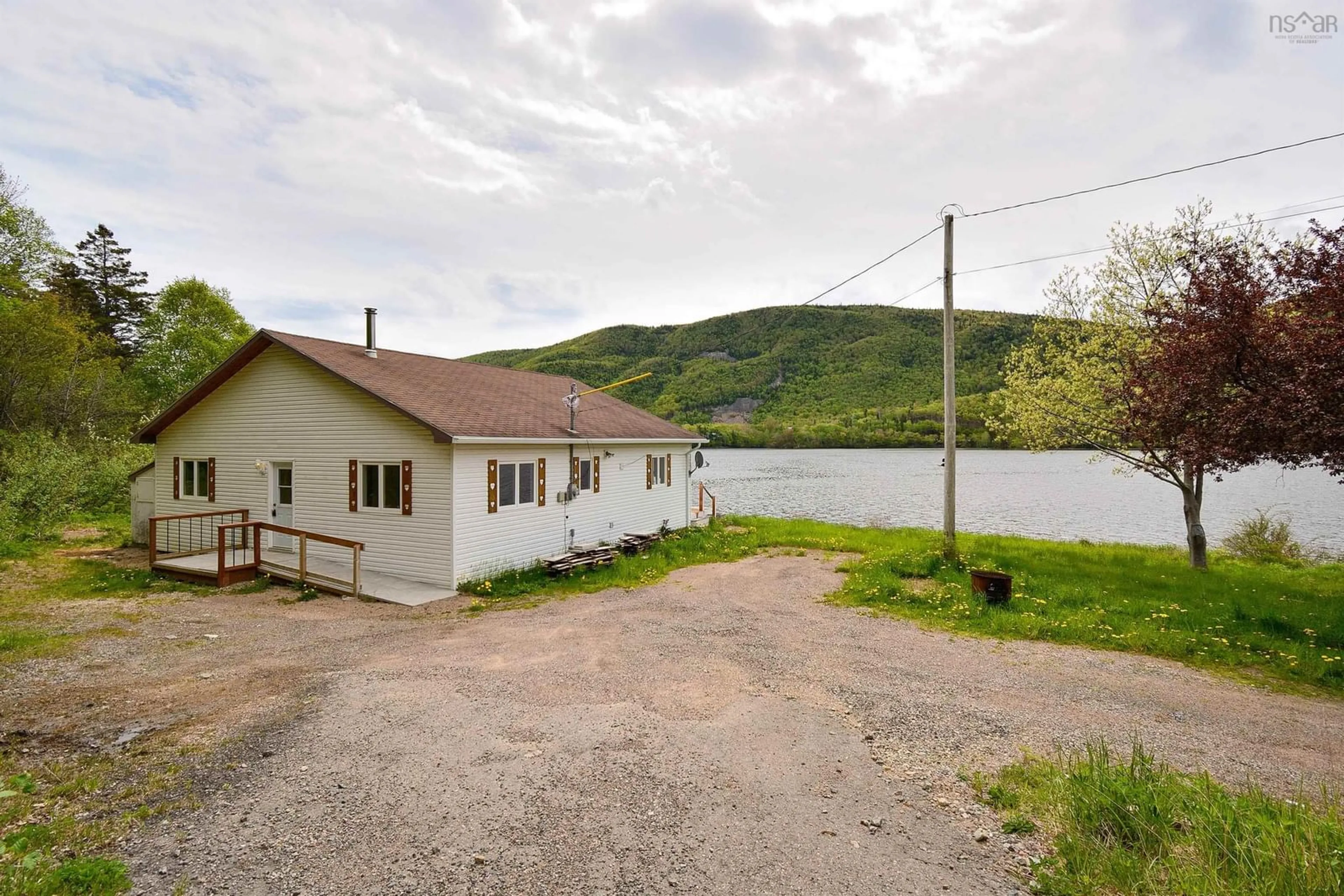 Patio, water/lake/river/ocean view for 38103 Cabot Trail, Ingonish Nova Scotia B0C 1L0