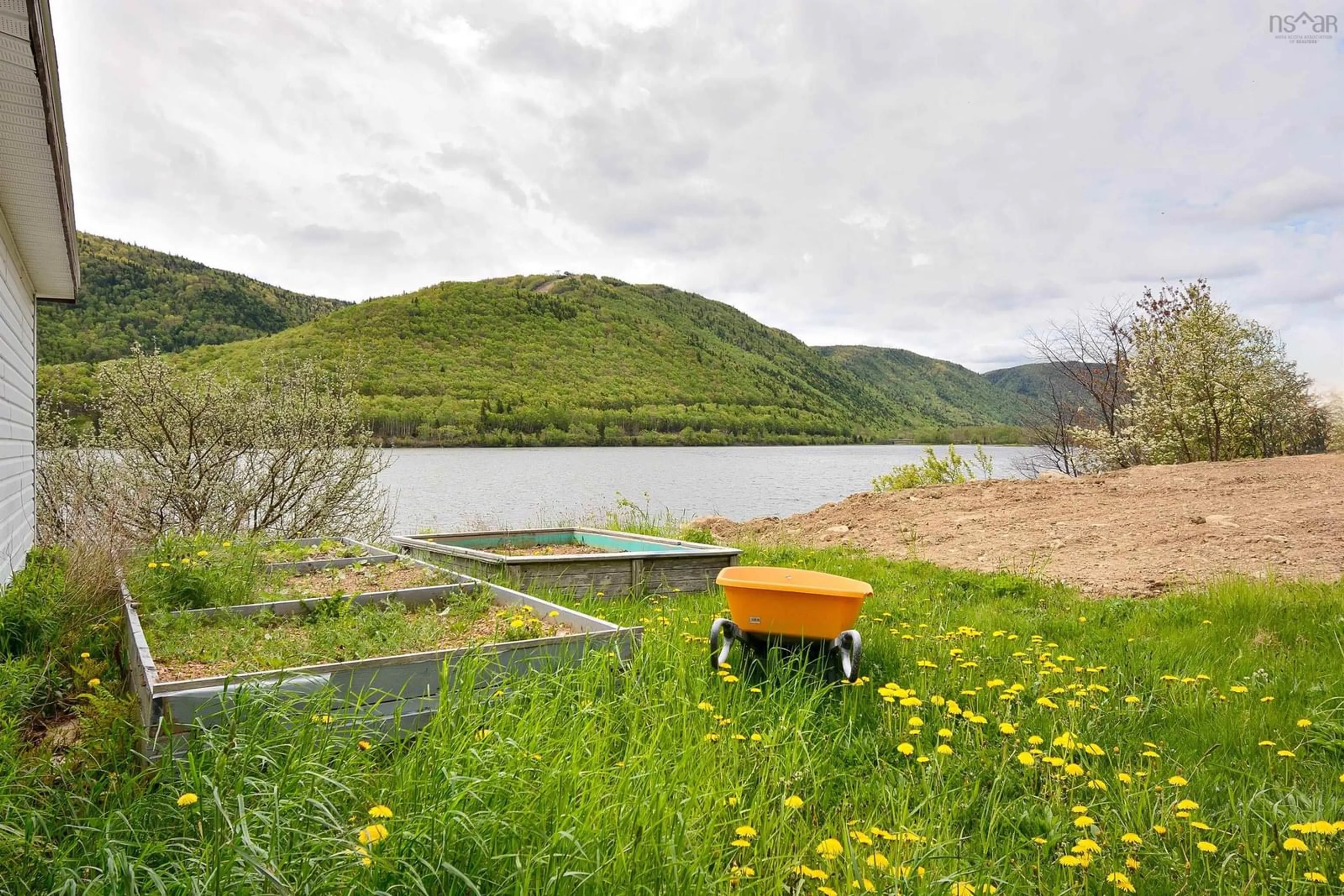 Patio, water/lake/river/ocean view for 38103 Cabot Trail, Ingonish Nova Scotia B0C 1L0